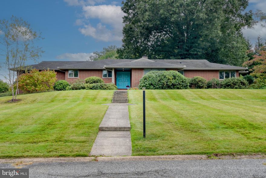 Price improvement! Prepare to be wowed when you walk through the front door. Gleaming hardwood floors, huge floor-to-ceiling windows, high-end kitchen and primary bath.  Floor plan that flows beautifully. 4 bedrooms and 2 baths.  Wood burning fire place in the living room.  House is filled with natural light. Two car garage under the house with unfinished basement. Windows, roof, appliances, and HVAC have all been replaced. Electric has been updated.  The list of improvements goes on.  Come see this for yourself.  It's gorgeous!