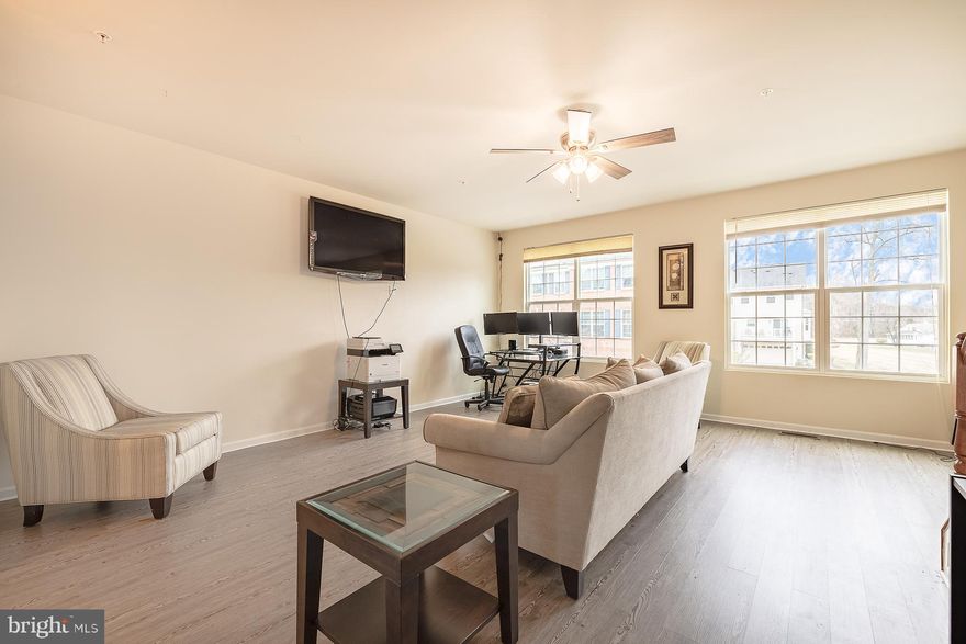 Situated in a quiet neighborhood, take a step into this wonderful 3 bedroom, 2 bathroom, 2 half bathroom END UNIT townhome. You ll be greeted by the spacious entryway, beautiful hardwood flooring, office/den, and a half bathroom. As you make your way up the stairs to the main level, take note of the sun-kissed open floor plan, ANOTHER half bathroom, and a granite countertop island in the kitchen. Located off of the kitchen sits a beautiful wooden Deck that is the perfect spot to watch the sun set or fire up the grill. On the Master level you ll find your ideally located washer and dryer, 2 full bathroom, Master suite, and remaining bedrooms. Your new home is equipped with a 2-CAR GARAGE for easy access parking!!! Located just a short drive from DC and the National Harbor. This community has walking paths perfect for an evening walk and a large playground for the little ones to explore.