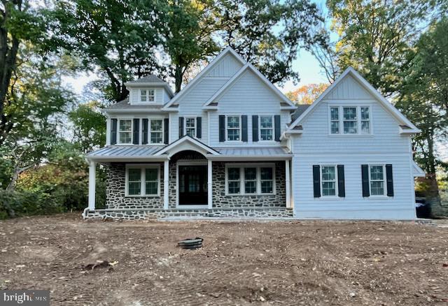 11 Crestline Road is the new construction home you've been waiting for. with over 6,000 sf of finished space. This stunning home has 4,527 square feet of luxurious above grade living space, five bedrooms and four full bathrooms on the second floor, two half bathrooms on the main level, first and second floor laundry rooms, a three-car side entry garage, a flagstone patio, covered flagstone front porch, massive finished basement with 9 and 10 foot finished ceiling height, and half bathroom, and a level .69 acre lot in the desirable Strafford Village neighborhood in Wayne. A flagstone walkway, flanked by professionally landscaped beds, leads to the covered front porch with wood ceiling and a custom mahogany front door with sidelights. First floor features will include site finished white oak floors with natural finish, office, dining room with custom moldings and decorative wallpaper, formal powder room, family room with coffered ceiling and gas fireplace, walk-in pantry with custom shelving, wet bar, mudroom with custom cubbies, half bathroom, and laundry room. The gourmet kitchen will be magnificent and including custom shaker style inset cabinetry and hood, quartzite countertop, backsplash, floating shelves, and a massive center island with overhang seating. The appliance package includes a 48" built-in side by side Subzero refrigerator, 48" Wolf Range, Cove dishwasher, and a drawer microwave in the island. Adjacent to the kitchen is a breakfast room with a sliding door to the rear patio. A white oak staircase with custom newel posts and direct set balusters leads to the second floor. The primary bedroom suite is sure to impress. It includes a spacious sleeping area with vaulted ceiling, two walk-in closets with custom shelving and drawers, and a spa like full bathroom with white Carrara wall and floor tile, custom double bowl vanity, soaking tub, private water closet, and a walk-in shower with dual shower heads, seat, rain shower head, and glass enclosure. All secondary bedrooms are large with walk-in closets. Bedrooms 2 and 3 share a Jack-n-Jill bathroom while bedrooms 4 and 5 have en-suite bathrooms. Another large laundry room and hall linen closet complete the second floor. Other features include 9 foot ceilings on 1st and 2nd floor, site finished white oak hardwood throughout second floor hallway, 2-zone HVAC with Honeywell thermostats, tile in the first floor mudroom, powder room, and laundry, inside access to three car garage, ample recessed lighting throughout, cased windows and doors, high-end plumbing and lighting fixtures, Hardiplank siding with thin cut real stone, Anderson windows, and Azek exterior trim . This walk-to-Wayne home is conveniently located close to all major commuter routes, the Septa Regional Rail, shopping, dining, the Strafford Library with basketball court, new tennis courts, and playground, North Wayne Park, and is part of the top rated Tredyffrin Easttown School District. The Strafford Village neighborhood has a voluntary civic association that hosts several functions throughout the year to allow neighbors to spend quality time together. Current taxes are for the land only and the home will be reassessed by Chester County. Listing agent is a member of the LLC that owns the property and therefore has a financial interest.