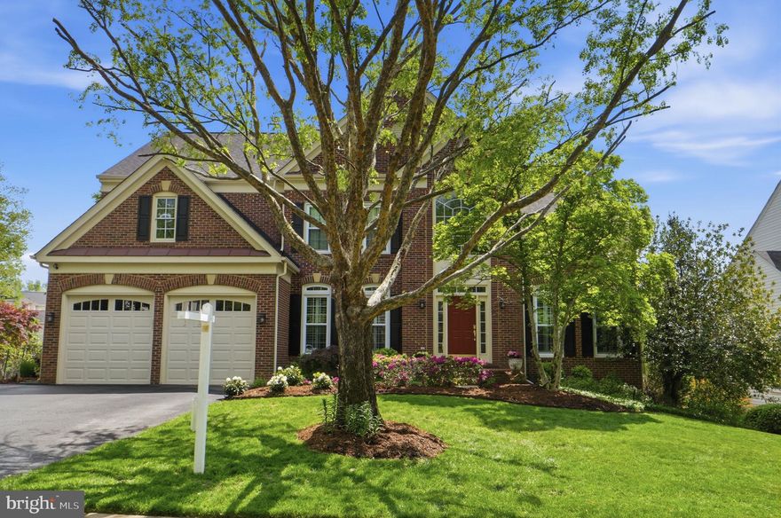 Visit our first open houses Saturday and Sunday and prepare to be amazed!  Welcome to this thoughtfully updated and renovated home in very desirable West Hampton, offering a blend of quality craftsmanship, modern upgrades, and functional living spaces. Natural light fills the interior through new windows on every level, highlighting custom grey-toned maple hardwood flooring, extensive molding, and well-designed living areas. The remodeled kitchen features glass-front cabinetry, designer tile, premium appliances, and an extended custom island with built-in china drawers, providing additional storage and workspace. The adjoining family room includes art gallery lighting, creating a clean and refined presentation. The primary suite includes a spacious layout with a remodeled spa-like bath featuring a Brizo “Falling Water” rain shower system with body jets and handheld shower, premium fixtures and exotic tile as well as a built-in TV. The custom walk-in closet is a masterpiece, offering LED lighting and upgraded organization, complemented by prairie shutters. The finished lower level provides flexible living space, including a private movie theatre with premium seating and JVC audio equipment, recreation area for a pool table, custom built-in shelving, and a dedicated home office with granite countertops, Thomasville cabinetry, and double closets. Additional features include a custom library, porcelain tile flooring, and distinctive aviation and nautical murals. Outdoor features include an expansive reinforced deck with lighting, an outdoor kitchen with grill and cooktop, and a professionally landscaped koi pond with fish designed by Merrifield Garden Center. Additional improvements include a custom laundry room with granite countertops and cabinetry, new garage doors with glass windows, and major system updates including roof, dual-zone HVAC, and water heater (2016), along with updated appliances throughout. This home offers a well-balanced combination of updates, functional spaces, and indoor-outdoor living.  The neighborhood is simply beautiful and so convenient to shopping, major commuting routes, FFC Parkway, Fort Belvoir and Springfield Metro!