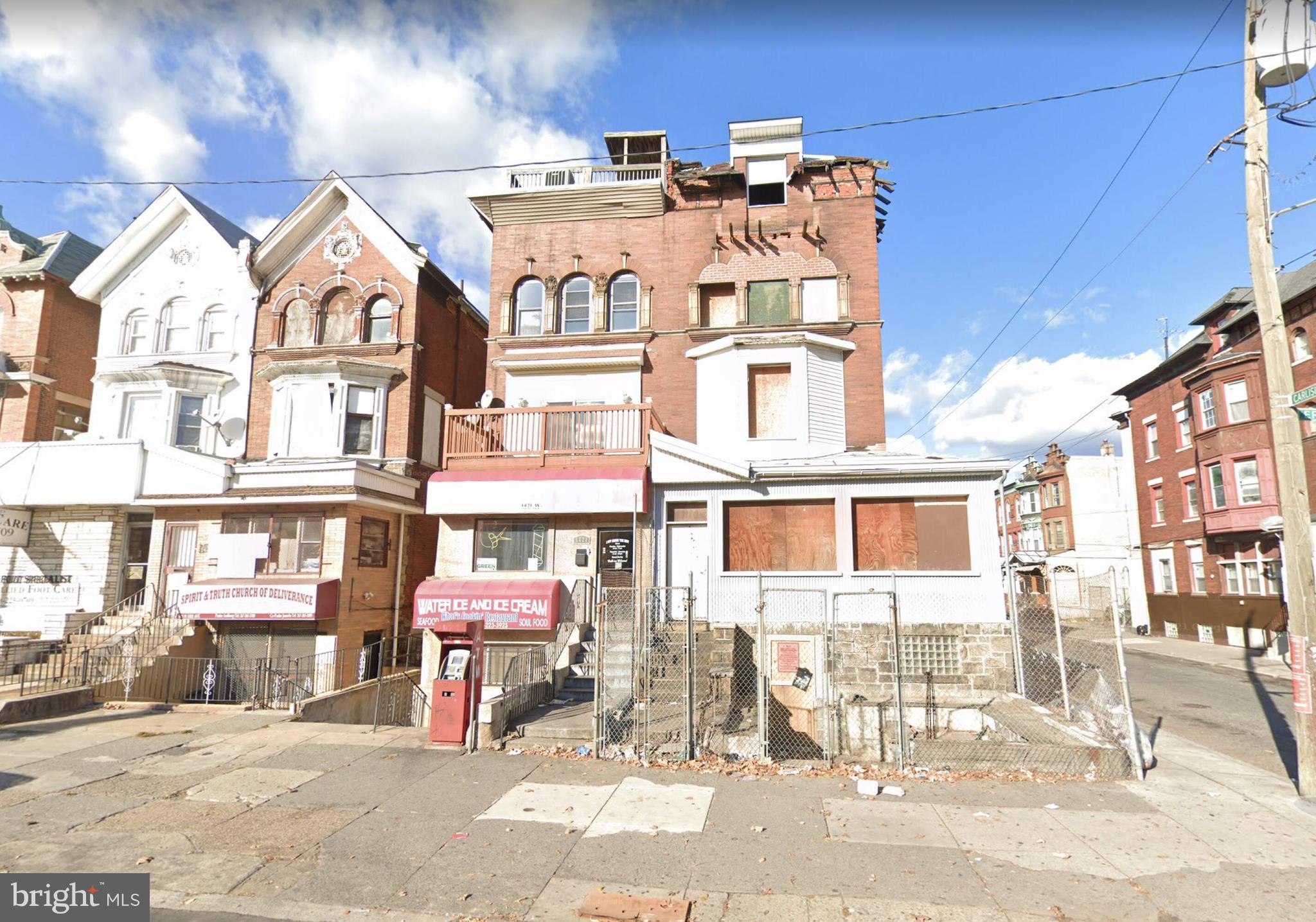 Recently appraised for $1.2m ARV building needs about 250k of work to this Value add legal 7 unit on bustling corridor, w/ a non conforming 5th residential unit on roof level. NOI is based on projections post construction and fully occupied. 3 commercial zoned spaces: 1st fl front is a small barber shop ( this tenant pays $3000 per month gross lease for the barber shop and 2nd floor residential units), 1st fl rear is a vacant salon, which also has real estate office zoning and basement level (undeveloped raw space) is zoned for a restaurant - up to 30 seats w/ private access to rear yard.