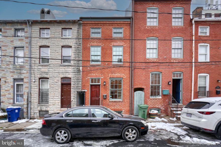 Discover the charm of this historic interior row townhouse in the vibrant Upper Fells Point neighborhood. Built in 1900, renovated in the 2000's, this property offers a unique opportunity to create your dream home in a community known for its rich history and lively atmosphere. Enjoy easy access to local amenities, including trendy cafes, boutique shops, and diverse dining options just a short stroll away. The neighborhood fosters a strong sense of community, with regular events and friendly neighbors enhancing the welcoming vibe. With 4 Bedrooms, 4.5 Bathrooms Chef's kitchen, pantry, Breakfast bar, the popular roof deck with stellar views,  this property provides plenty of space and options to create your dream home.   This home is not only located in the historical area of Fells point, it is only a few blocks to Johns Hopkins Hospital campus.  Embrace the potential of urban living in a location that balances historic charm with modern conveniences. Don't miss your chance to be part of this thriving community!   Please note the professional pictures were taken prior to tenants moving into the property.