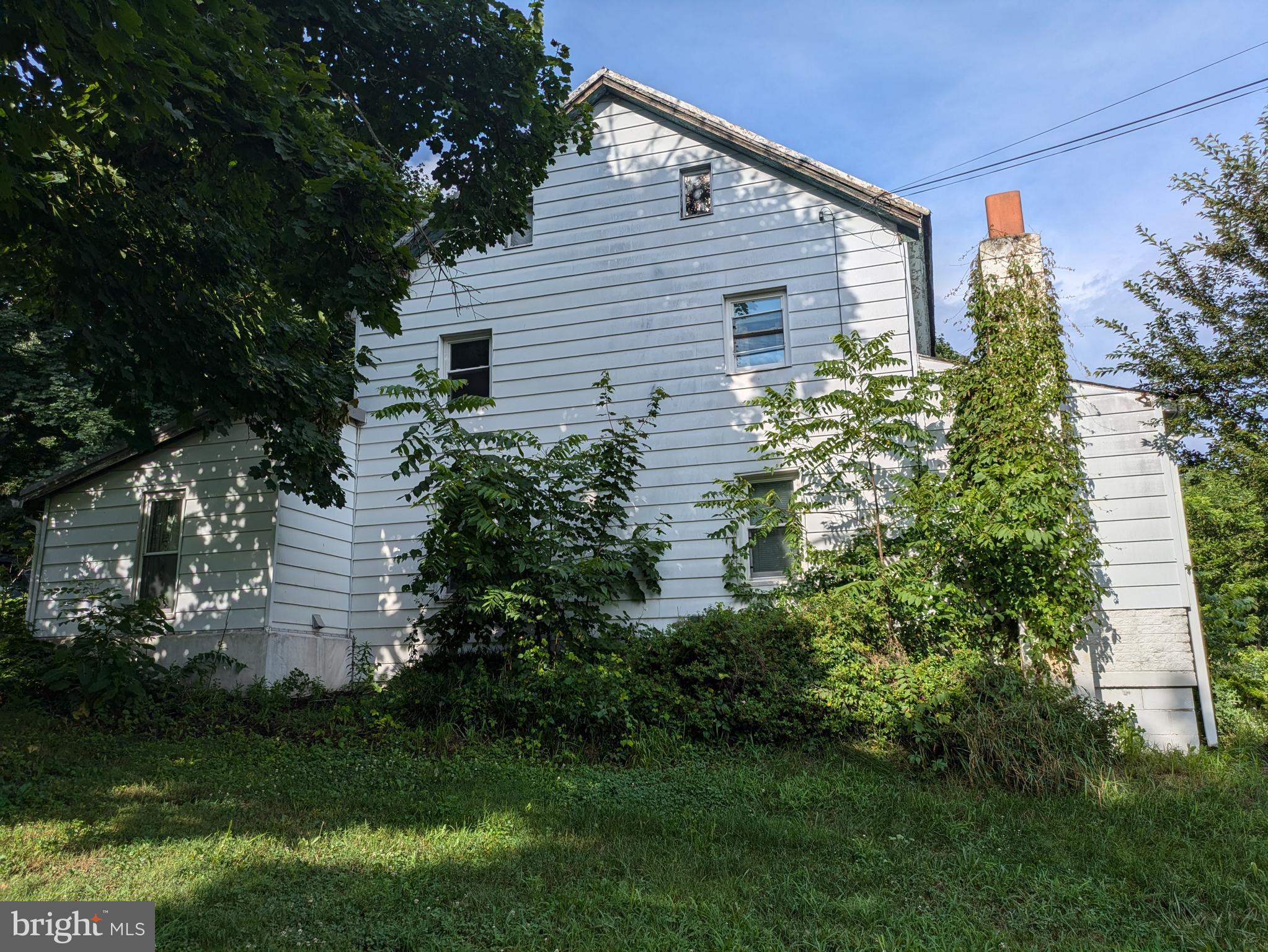 This is an auction property! The auction will take place live at the property on Thursday, August 14th @ 6:30pm. The price listed is not in any way the sale price and being an auction the property may sell for less or may sell for more on auction day. Located in Carroll Township, this two story home is situated on 2.5 acres. This house is an early log home with some frame additions. The main floor has a kitchen, full bath, one bedroom, living room, and a porch that was enclosed which is an additional living area. The second floor has 3 bedrooms. There is a walk up attic. Outbuildings include one cinderblock butcher shop, and two frame sheds. 100amp electric, and is serviced by well water, and on site septic. Heat and domestic hot water is oil fired hot water, and a coal burning Alaska Stoker stove on the first floor that will heat the house. Anyone interested in this opportunity is strongly encouraged to come to one of the open house times and make your plans. Open house dates are: Sunday, July 20th from 1:00-3:00pm, Sunday, August 3rd from 1:00-3:00pm. Buyer pays the 2% state transfer tax at settlement.