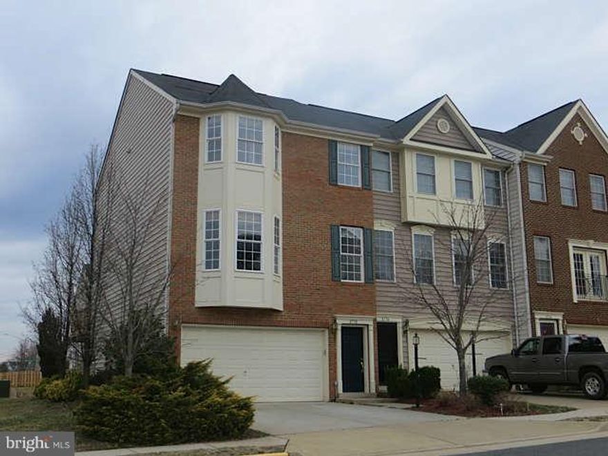 End Unit: Former Model Home on Premium Lot; 2517 SQFT. 3 Finished levels; Bump Outs; 2-Car Garage.  Hardwoods, Carpet; Gourmet Kitchen; Breakfast RM; Family RM w/Fireplace. Close to I-66, VRE,PW Parkway, Shopping