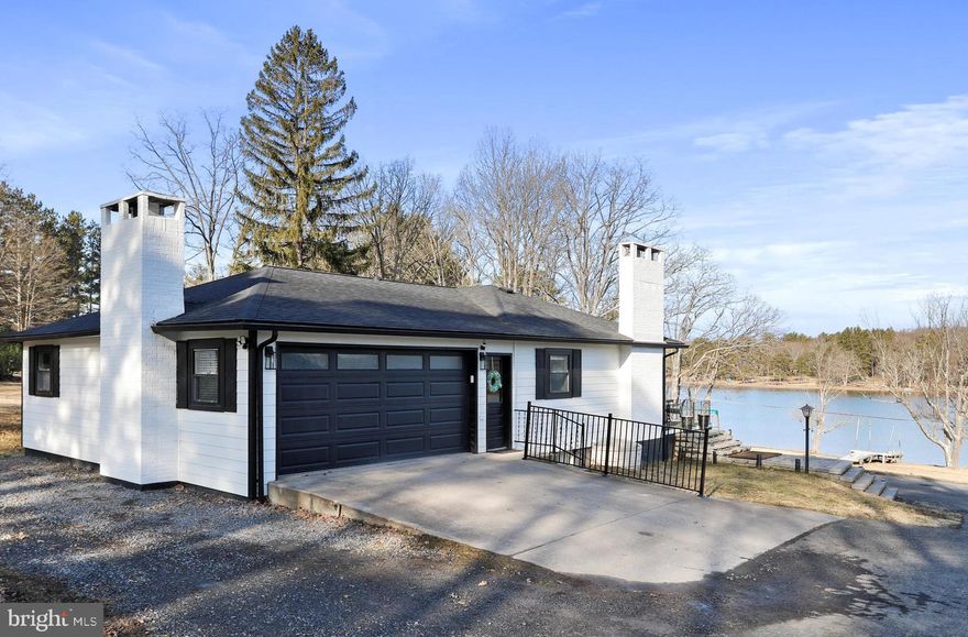 Welcome to your dream lakefront retreat at Deep Creek Lake! This newly remodeled three-bedroom, three-and-a-half-bathroom residence offers the perfect blend of luxury and lakeside living.

Step inside to discover a fully transformed interior where modern elegance meets comfortable living. The open-concept design creates a seamless flow between living spaces, perfect for entertaining or relaxing with family. 

The true magic of this property lies in its exceptional outdoor spaces. Your private dock slip awaits, offering immediate access to the waters of Deep Creek Lake. The expansive deck serves as an ideal setting for outdoor dining, sunset watching, or simply soaking in the breathtaking lake views. Whether you're an avid water sports enthusiast or someone who appreciates the tranquility of lakefront living, this property delivers the best of both worlds.

Located in a prime position on Deep Creek Lake, you're just minutes from Deep Creek Lake State Park, local dining favorites, and year-round recreational activities. The property's proximity to restaurants like Firewater Kitchen & Bar and the popular Honi Honi Bar means entertainment is never far away.

This turnkey property represents a rare opportunity to own a fully renovated lakefront home in one of Maryland's most sought-after vacation destinations. Don't miss the chance to make this stunning waterfront retreat your own piece of paradise.
