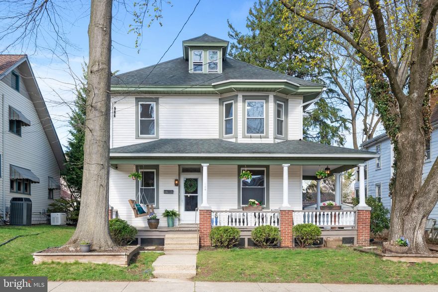 This charming home, built in 1922, has been thoughtfully updated with modern touches and amenities while maintaining its classic character. With 4 spacious bedrooms, 1.5 bathrooms, and over 1,900 square feet of living space, this home is perfect for families seeking both comfort and style.
As you step from the expansive front porch into the entryway, you are welcomed by warm hardwood floors and floods of natural light. The living room, to your right, offers a cozy window seat for you to settle in with a good book. The space is freshly painted and boasts exquisite architectural woodwork: broad baseboards, tall windows with detailed framing, wainscoting and crown molding. The dining room, too, has elegant designs to elevate the space: chair rail, stained glass window, and a unique light fixture. Just off the dining room is a discrete and convenient half-bath. The dining room leads easily to the kitchen, making entertaining a breeze. 
The kitchen is the heart of the home. The new flooring, stainless steel appliances, and clean tiled backsplash create a calm, light-filled space where everyone will want to gather. The ample cabinetry and quartz countertops make the space both beautiful and functional. A laundry room and mud room are just off the kitchen, giving access to the back garden and stunning deck. A pergola covers the deck area, and provides an outdoor oasis for eating al fresco or relaxing with friends on a warm spring evening.
Upstairs are four bright and spacious bedrooms. The plush carpet, new light fixtures, and fresh paint enhance the home’s fresh, contemporary feel and create a warm and inviting space for everyone. The bathroom is newly updated with fresh paint and wainscoting, a new toilet and hardware, and new flooring. 
A fenced-in yard and a 1-car garage at the back of the property gives you privacy and all the outdoor space you need for gardening, playing, and additional storage. This home is move-in ready and provides a perfect balance of historical charm and modern updates. Settled in the heart of Manheim, just a stone’s throw from Lancaster and Lititz, this is a home you will not want to miss!