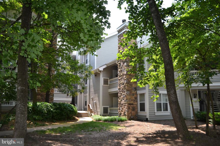 Beautiful 1 BR, 1 BA Condo in the Sought After Community of Stonecroft! Located on the Lower Level, Updated Kitchen with Granite Countertops, New Plush Carpet, Freshly Painted, New Blinds, Wood-Burning Fireplace, Updated Bathroom with Stackable Washer & Dryer.  Master Bedroom has a Walk-In Closet and Sliding Glass Door to the Balcony. Walking distance to Fair Lakes Shopping Center.