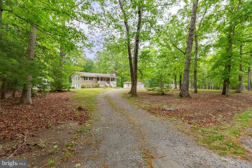 Welcome home to this charming rambler situated on a beautiful 4.40-acre corner lot offering space, comfort, and privacy! This well-maintained home features 4 bedrooms and 3 full bathrooms with an open-concept layout perfect for everyday living and entertaining. The spacious kitchen flows seamlessly into the dining and living areas, creating a warm and inviting atmosphere.

Enjoy hardwood floors throughout the main living area and hallway, along with new carpet in all bedrooms. The fully finished basement offers additional flexible living space, including a spacious family room with new carpet, making it ideal for entertaining, guests, or a home office.   A large laundry room with extra storage adds convenience and functionality.

Outside, you’ll find even more to love with a detached oversized garage and a large shed/workshop with electricity, perfect for hobbies, storage, projects, or additional workspace. The large backyard backs to trees, offering a peaceful and private setting to enjoy nature and outdoor living. Relax on the welcoming front porch, spacious back porch, or deck overlooking the beautiful property. With all new kitchen appliances and new staianless steel kitchen sink, generous indoor and outdoor living spaces, and a desirable corner lot location, this property offers the perfect blend of country charm and modern updates.