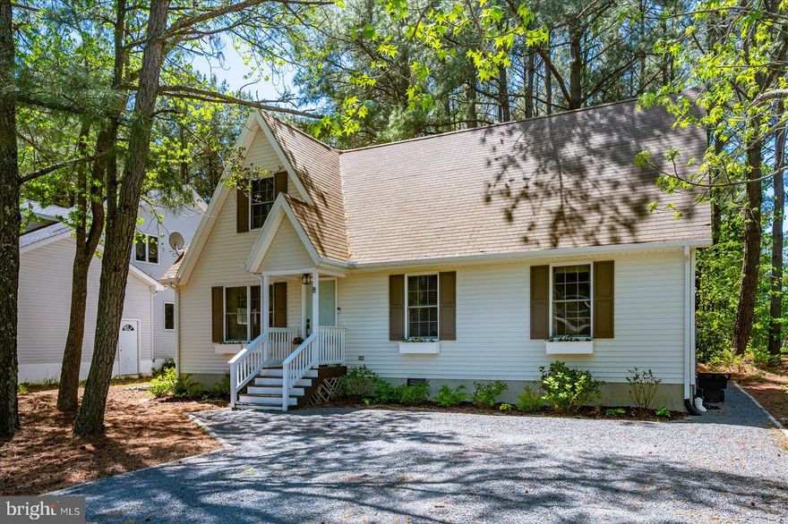 Beautifully updated 4-bedroom, 3-bathroom home featuring a screened porch, sunroom, and versatile flex spaces, designed for both comfort and functionality.  Upon entry, an open-concept layout welcomes you with luxury vinyl plank flooring throughout the entire home, creating a seamless, modern feel.   A spacious living area offers plenty of room for entertaining or relaxing, enhanced by multiple windows that bring in soft, natural light.  Designed with both everyday living and hosting in mind, the kitchen features upgraded granite countertops, a 6-burner gas stove, built-in microwave, energy-efficient refrigerator, and an expansive island with ample seating.  An adjacent eat-in area adds convenience and charm.  Main level includes a full bedroom and bathroom, ideal for guests or multi-generational living.  Upstairs, you’ll find three additional bedrooms along with two flex spaces currently used as an office and workshop, perfect for remote work, hobbies, or future customization.  A private primary suite overlooks the rear yard and includes an ensuite bathroom.   Just off the dining area, a bright and inviting sunroom flows into a screened porch, creating a seamless indoor-outdoor experience. Fenced backyard provides privacy and space to enjoy, with additional privately owned land beyond,  offering even more room and potential.  Located in the amenity-rich community of Ocean Pines, residents enjoy access to four outdoor pools, one indoor heated pool, an 18-hole golf course designed by Robert Trent Jones Sr., a yacht club with full-service restaurant, two marinas, and multiple boat launch sites.  Additional amenities include a community center, tennis complex, pickleball and basketball courts, volleyball, skate park, dog park, beach parking in Ocean City, a beach club with grill and bar, kayak rentals, farmers market, social clubs, civic organizations, and scenic walking paths.  A perfect blend of space, upgrades, and lifestyle amenities...truly a gem.