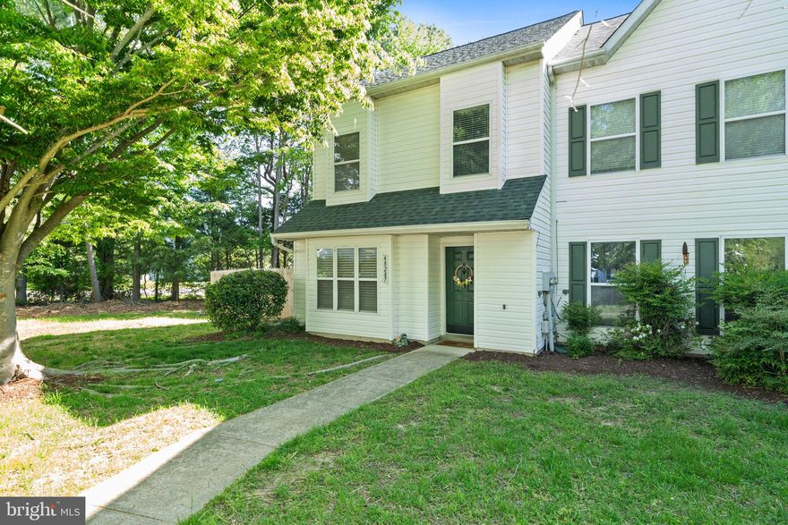 Welcome to this charming end-unit townhouse conveniently located just minutes from Pax River Naval Base in Saint Mary’s County! The main level of this home offers a spacious kitchen boasting an island with additional seating, a large table area, a cozy family room featuring a wood-burning fireplace and a powder room. Off family room, enjoy easy indoor-outdoor living with two sets of sliding glass doors leading to the backyard. Upstairs, the exceptional loft-style primary suite features vaulted ceilings, a separate sitting area and bedroom space, a walk-in closet, and an attached full bath. Upstairs also includes two nicely sized bedrooms, both equipped with ceiling fans, and a full hallway bathroom. Other highlights include heat pump replaced just a few months ago, attached storage shed, a fully fenced lot, and an HOA that covers lawn care, walkable beach access, trash services, snow removal, and more. Don’t miss your chance to get in the door on this one — schedule your showing today!