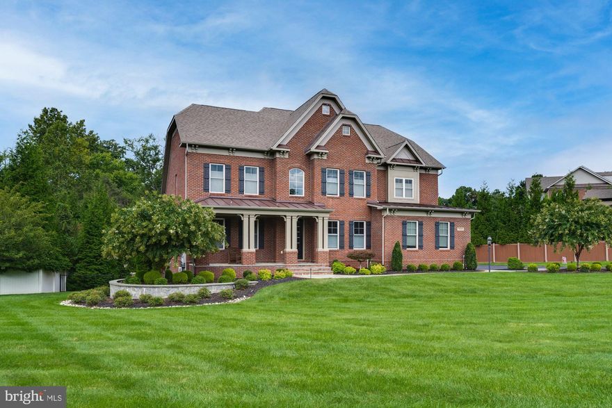 Stunning 4 bedroom, 6.5 bath estate home featuring 6,747 square feet of finished living space. Breath taking features include expansive patio, outdoor pool, chef's kitchen, two story family room, main level spa-like accessible bathroom, and lower level entertainment space. Foyer opens to both formal living and dining rooms with recessed lighting and crown moulding. The chef's kitchen with butlers pantry, large island, and breakfast room is the heart of the home which opens to the two story family room. The main level is rounded out by an accessible full bath, half bath, mudroom, laundry room, and office. Upstairs houses a spacious owner's suite with dual walk-in closets and spa-like en suite bathroom. Three additional bedrooms two of which have with their own private en suite bathrooms and an additional full bath. The lower level is the perfect space to host guests. Additional living room opens to a spacious recreation area with gorgeous wet bar. Additionally there is an exercise room, office that can be utilized as guest room, and full bath. Outside you will find an oasis with private, in-ground saltwater pool, patio, and deck. This home has extensive landscaping making it feel like a tranquil escape. 3 car, side load garage, Tesla charging station, extensive solar panel installation, and private driveway. Located in one of Oakton's most exclusive neighborhoods and Oakton Pyramid.