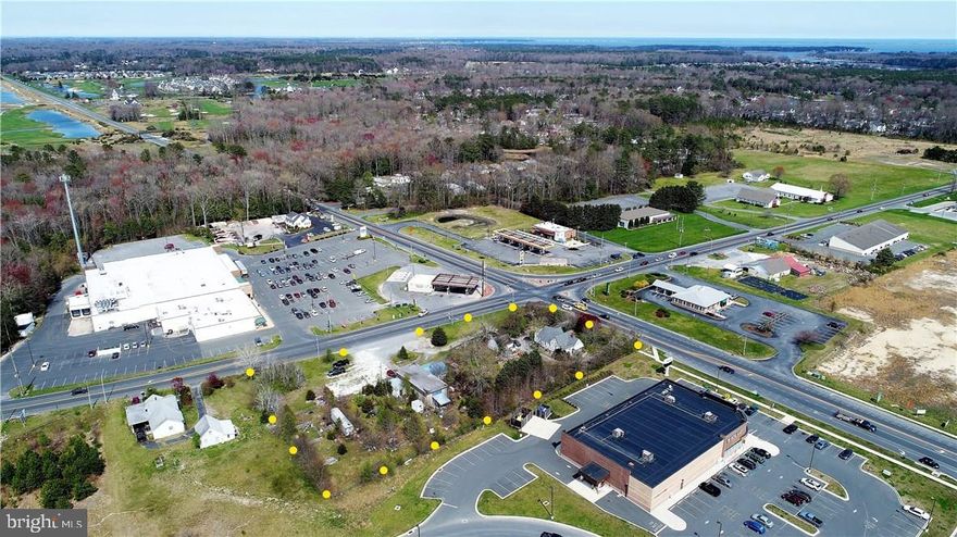 Possible commercial opportunity in thriving business area of Long Neck.  1.96+/- acres at the busy intersection of Rte 24 & Rte 5.  Take advantage of this prominent location with maximum visibility on this corner parcel.  Currently zoned AR1.