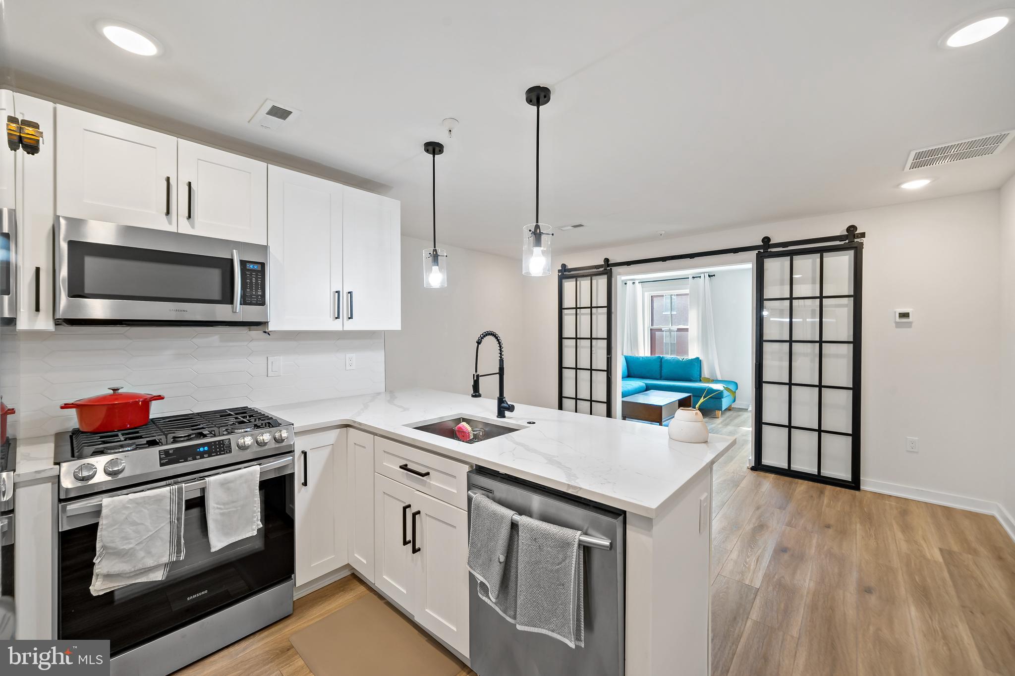 Luxury Fairmount Living – Sun-Drenched Spaces, Private Roof Deck & Stunning City Views.
Welcome to 1517 Green St #4, a sunny, south-facing luxury ONE BED PLUS DEN apartment in a boutique, four-unit newer construction building in the heart of Fairmount/Spring Garden! Designed for both style and flexibility, this home offers high-end finishes, modern conveniences, and an unbeatable location in one of Philly’s most walkable and vibrant neighborhoods.
Step into a bright and airy space where southern exposure floods the home with natural light all day long. Originally designed as a two-bedroom layout, the current configuration offers a versatile open-concept design with a custom matte black glass sliding door separating the main living area. This allows you to create a private second bedroom, home office, or cozy lounge while maintaining an open, spacious feel. The space off the kitchen is large enough to serve as a dedicated dining area, perfect for hosting dinner parties or setting up a stylish work-from-home space.
The gourmet kitchen boasts stainless steel appliances, quartz countertops, and custom cabinetry—ideal for those who love to cook and entertain. The spacious primary bedroom easily fits a king-size bed with room for extra furniture and features a large walk-in closet for all your storage needs. Just outside the bedroom, you'll find a full-size in-unit washer and dryer for ultimate convenience. The bathroom completes the suite with dual sinks, a sleek vanity, and a large walk-in shower for a truly luxurious experience.
But the real showstopper? Your private roof deck with breathtaking city skyline views! Outfitted with electric and water hookups, this space is perfect for string lights, lush greenery, and entertaining under the stars.
This boutique four-unit building offers a more private and exclusive living experience. Enjoy peace of mind with a secure access system featuring a video intercom. Parking is convenient with easy street parking within Resident Permit District 6, plus private parking options nearby. The home is equipped with modern safety features including smoke alarms, sprinklers, and secure entry. Situated in an unbeatable location, you're just steps from the Broad Street Line, Divine Lorraine, Osteria, multiple gyms, and ALDI & GIANT grocery stores, along with a variety of top-tier dining, shopping, and entertainment options.
This is a rare opportunity to enjoy boutique luxury living with a flexible layout in one of Philly’s most sought-after neighborhoods. Showings begin April 10th. Available for move-in as early as May 15th. Strong preference for a 2-year lease (1-year minimum considered). Pets will be considered on a case-by-case basis. 3D Floor Plan available by request. Schedule a tour today!