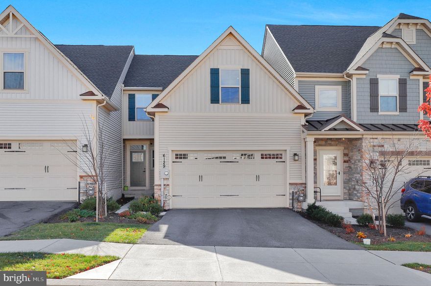 Welcome to this beautifully maintained interior townhome in sought-after Harrington Terrace! This move-in ready home features 3 bedrooms, 3 full baths, and one half bath, offering comfort and modern living at its best. Enjoy the open-concept layout with a seamless living and dining area, perfect for entertaining. The entry-level primary suite boasts a spa-like bathroom for a relaxing retreat. The fully finished basement provides additional living space—ideal for a home office, gym, or recreation area. Plus, a two-car garage adds convenience and plenty of storage. Stylish, spacious, and ready for you to call home!