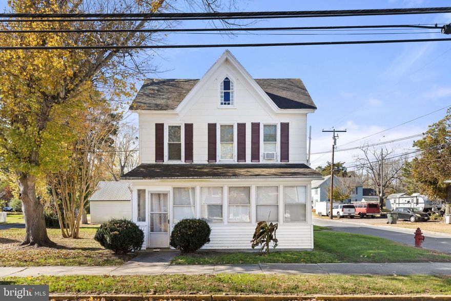 Two units or one… You choose!

Currently divided into two separate apartments, this home provides a rare opportunity to live in one until and collect rental income for the other or convert the home back to a spacious single-family residence.

Located just a few blocks from vibrant downtown Snow Hill and the tranquil Pocomoke River, this residence is a haven for those who appreciate the perfect blend of community and history.

With its inviting facade and cozy appeal, the home boasts approximately 1680 total square feet of character-filled living space. This charming home features a two-car detached garage with an extra storage space with loft. The large corner lot offers plenty of outdoor space for activities and gatherings, while off-street parking for 6 or more cars, boats or other toys provides the convenience you desire.

The home's layout is as versatile as it is charming, with each apartment exuding its unique personality. The downstairs apartment features an sunny side porch/mud room entry, one oversized bedroom, a large eat-in kitchen, spacious living room and large full bathroom with washer/dryer hookups.

The upstairs unit features a smaller kitchen and living room, another oversized bedroom, a second bedroom/office with walk-up attic access, a full bathroom, and the gorgeous original staircase that affords private access to the enclosed front porch.

This property is not just a home; it's a lifestyle. This home’s location, just a few blocks from Snow Hill High School, and its proximity to downtown shops and restaurants means you're never far from the town's pulse. Don't miss this chance to own a piece of Snow Hill magic – a cozy, multifaceted haven with many possibilities.