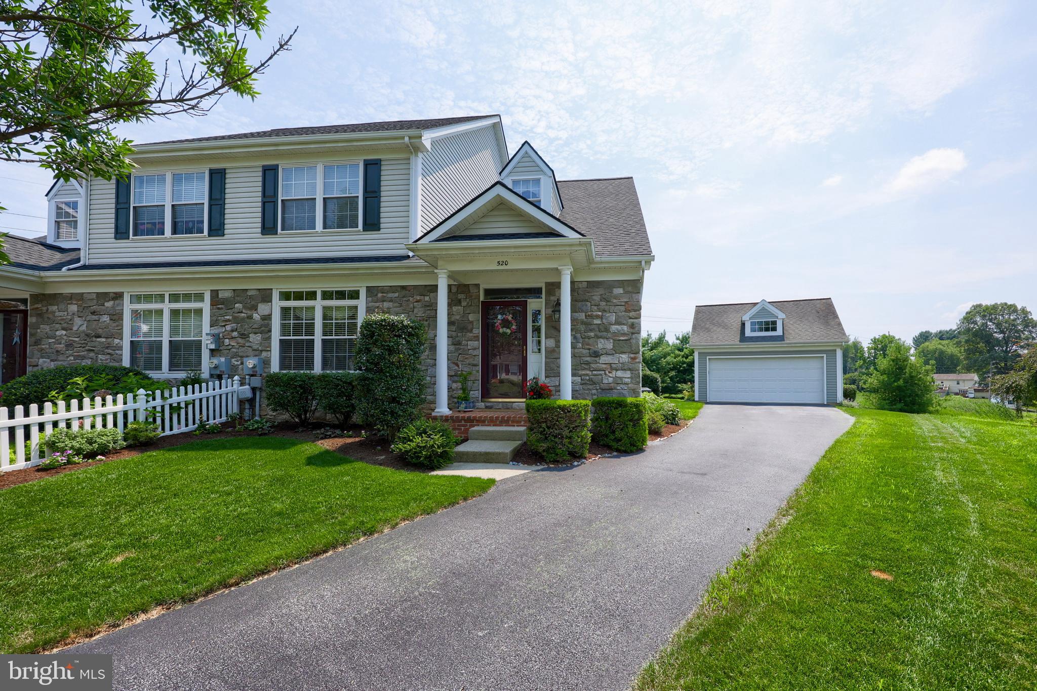 Nestled in a quiet cul-de-sac in the highly sought-after Kissel Hill Commons neighborhood, this stunning semi-detached home offers the perfect blend of luxury, convenience, and tranquility. Ideally located just minutes from Lititz Borough, Lancaster City, major highways, shopping, parks, and top-rated schools, this home provides effortless access to everything you need while maintaining a peaceful retreat. A bright, vaulted foyer with hardwood floors welcomes you into a spacious living room featuring 9-foot ceilings and a cozy fireplace with a stone surround, creating an inviting atmosphere. The first-floor bedroom connects to a full bathroom and laundry, offering comfortable one-story living options. The bright and cheery kitchen boasts tall ceilings, abundant natural light, and stainless steel appliances, making it a joy for cooking and entertaining. The adjacent dining area flows seamlessly to a screened-in porch, the perfect spot to relax and enjoy serene views of the private backyard, open space, and pond. From the porch, access the oversized 2-car garage and private driveway—a rare and valuable feature in this community. Upstairs, discover three generously sized bedrooms, another full bathroom, and a linen closet for extra storage. The expansive lower level adds versatile living space, including a large family room or rec area and a home office complete with a built-in desk and bookshelves—ideal for remote work or study. With its prime location, upscale finishes, and thoughtful layout, this home is a rare find in Kissel Hill Commons.
