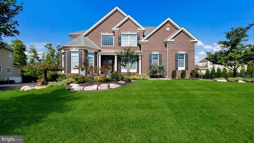 Welcome to 2807 Hoffs Way - this stunning, meticulously maintained home features 4 bedrooms, 5 baths, and a 2-car garage, all nestled in the desirable Warrington Glen community within the award-winning Central Bucks School District. Move-in ready, this residence showcases the highest finishes and attention to detail, perfect for the most discerning buyer. As you approach the home, you’re greeted by professional landscaping and a charming paver walkway leading to a welcoming porch. Step inside through custom front doors into a grand two-story foyer adorned with beautiful hardwood floors that flow throughout the first level. The front office boasts custom built-ins and a full bathroom, ideal for working from home. The expansive living and dining areas are elegantly designed with custom moldings, recessed lighting, and large windows that fill the space with natural light. Next, discover the heart of the home: a chef's dream kitchen featuring a large center island, a six-burner Wolf range, stainless steel hood vent, built-in microwave, and Sub-Zero beverage fridge. The upgraded upper glass cabinets with lighting and the custom backsplash enhance the kitchen’s appeal. A bright breakfast area with a skylight and French glass doors leads to the outdoor space, seamlessly connecting to the spacious family room, complete with a gas fireplace and ample windows. The custom mudroom is a functional gem, equipped with cabinetry, a sink, and granite countertops for all your storage needs. This space leads into the garage, which offers additional slat wall storage and a service door for convenience. Upstairs, the large primary suite awaits, featuring a tray ceiling, sitting area, walk-in closet, and recessed lights. The luxurious primary bath includes ceramic tile, dual sinks, a soaking tub, and a separate shower. Bedrooms two and three share a full bathroom, while bedroom four has its own en-suite and walk-in closet. The conveniently located laundry room offers abundant cabinetry and ceramic tile floors. Descend to the finished lower level, where no expense has been spared. Custom steps with metal railings lead to this versatile space, featuring durable tile flooring and a stacked stone accent wall, perfect for movie nights or watching the big game. The strategically placed bar with wood trim, lighted cabinetry, and wine racks makes entertaining effortless. The kitchenette is equipped with ample cabinets, floating shelves, and stainless-steel appliances, ensuring every gathering is a hit. Custom lighting and a second gas fireplace add ambiance to this exceptional space. Step outside to a beautifully designed paver patio with multi-levels, a pergola, and a gas fire pit surrounded by mature landscaping for privacy. The fully fenced backyard is one of the largest in the community, providing ample space for outdoor activities and summer barbecues. Warrington Glen offers convenient access to Valley Square, Nike Park, and major routes such as 611, 152, and Street Road. Don’t miss your chance to call Hoffs Way your new home—schedule a showing today!