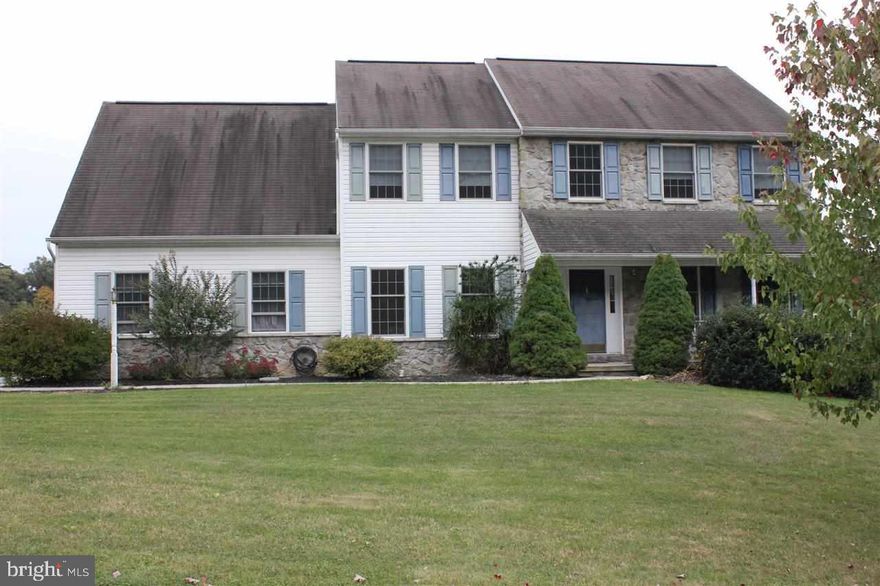 More bang for the buck. This home features a large master suite, 9' ceilings, attractive stone and vinyl front exterior with a covered porch and a partially finished basement. Priced to beat out the competition!
