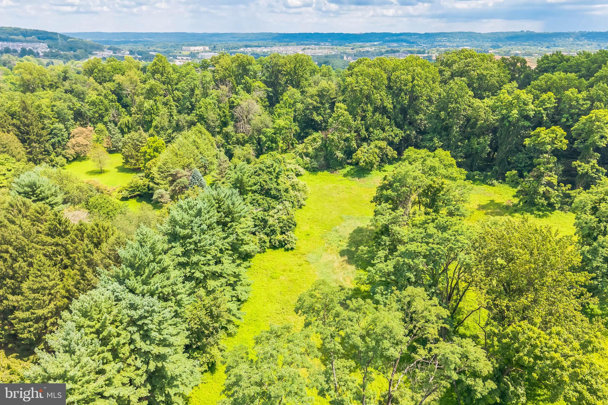 A Rare Opportunity in Coveted Charlestown Township – Welcome to Constant Spring
Just under 50 acres of breathtaking natural beauty await in this truly extraordinary offering. Nestled in one of Chester County’s most private and serene settings, Constant Spring is a peaceful retreat where nature and history converge. This cherished property, held by the same family for nearly 60 years, offers unrivaled tranquility and boundless potential for the discerning buyer.
The estate features a historic stone farmhouse dating back over 200 years, rich with character and original architectural details including handcrafted moldings and hardwood floors. With vision and restoration, this home has the potential to become a stunning legacy residence.
In addition to the main home, the expansive grounds with many mature trees, include a variety of outbuildings: a charming carriage house, a large barn, six bay equipment barn, kennel, studio, a gym with a 3 bay garage and a versatile pond shed. The land also provides for the opportunity to build an additional luxury residence, creating perhaps the crown jewel for a unique one-of-a-kind estate.
A refuge for songbirds and other native wildlife, Constant Spring offers peace, privacy galore, and picturesque views in every direction—ideal for those seeking a unique sanctuary with easy access to modern conveniences.
Though completely secluded and not visible from the road, Constant Spring is just 30 minutes from Philadelphia, major highways (Rt. 76, PA Turnpike I-76), regional rail, Including Amtrak, SEPTA top hospitals, prestigious colleges, cultural venues, and premier shopping destinations.
Private showings only. Appointment required. PLEASE Do not enter the driveway without a scheduled tour. All visits must be accompanied by a listing agent
* This property consists of the following parcels in total ; 35-04-0028,35-04-0028,0200,35-04-0028-0300,35-04-0029 *