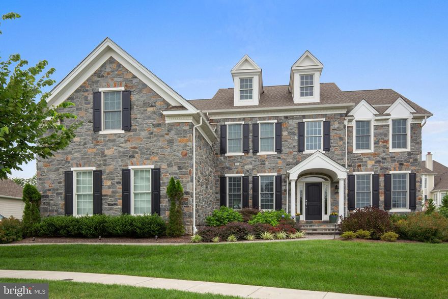 Welcome to this beautiful, custom built home in the sprawling, award winning 50 acre community of Liseter. You will enter this extraordinary Duke Model in The Bryn Mawr Collection by the front walkway, through upgraded landscaping, and step onto the flagstone front porch. Upon entering you will be wowed by the open floor plan with many well appointed upgrades. You will enter into the two story foyer filled with natural light, and on opposite sides of the foyer you will find the elegant dining room and comfortable living room. The beautifully upgraded Palladian kitchen layout showcases a large center island that provides a great gathering place for friends and family, custom kitchen cabinets, pendant lighting, under cabinet lighting, island prep sink and Chef s Kitchen equipment package, a feature package that  makes this kitchen extraordinarily special. Also in the open concept kitchen you will find a breakfast dining area and large walk in pantry. Just beyond the pantry is the mudroom entry leading conveniently to the 3 car garage. The open concept first floor boasts a two story family room with floor to ceiling custom stone fireplace, and custom sliding barn doors that conveniently hidee the wall mounted television, just next to the entry of the sun filled office. The first floor is complete with Hickory hardwood flooring. Outside the kitchen s glass doors, the backyard welcomes you with an expanded patio with built in gas grill and fire pit. The lower level of this home could be the very best part! The current owner went all-out in creating this entertainers dream space. The main space includes a full kitchen/bar with Quartz countertops and island seating, dishwasher, convection oven/microwave, commercial back bar refrigerator, and clear ice machine. Also on the lower level you will find a full wall of wine storage, a family room area with 10 foot projection screen TV, as well as a playroom, bedroom and full bath. Upstairs you will find 4 additional bedrooms and 3 full bathrooms, with upgraded carpet & custom paint throughout. The spacious Master Suite has expanded walk in closets, a fabulous spa-like bathroom with Ultra shower with 2 shower heads, Granite countertops and custom tile in all upstairs bathrooms. Don't miss this beauty, it won't last long!