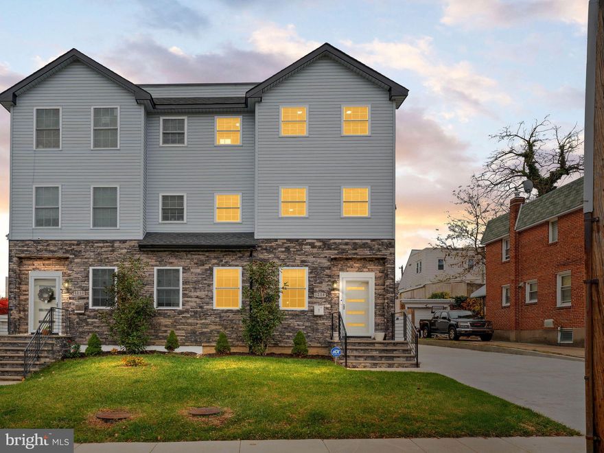 Step into exceptional living at 1214 Roosevelt Dr., where modern design, generous space, and everyday convenience come together in this stunning almost-new twin home, built in 2023.

Offering approximately 3,200 sq. ft. of total living space, this home provides room for every lifestyle, including roughly 2,400 sq. ft. of finished interior space plus an 800 sq. ft. finished basement complete with a full bathroom.   Whether you’re commuting into the city, catching a flight, or enjoying nearby shopping within walking distance, the location makes daily life seamless.

Outdoor living is another standout feature.   Enjoy the fenced-in backyard with a Trex deck perfect for morning coffee or weekend grilling, or take advantage of the expansive walk-out rooftop deck, offering impressive 360-degree views—perfect for relaxing or entertaining.   Newer construction is hard to find in this neighborhood, making this home a uniquely valuable opportunity.

Inside, you’ll find 4 bedrooms and 4.5 bathrooms, enhanced by 10-foot ceilings on the main level and 8-foot ceilings on the upper floors for an open, airy atmosphere.  The chef-inspired kitchen boasts quartz countertops, Samsung stainless steel appliances, and the innovative Samsung Bespoke Series refrigerator, all connected to a bright and spacious living area with beautiful hardwood flooring.

The second floor features two generously sized bedrooms, a full hall bathroom, and a convenient laundry room.   The third floor offers TWO private suites, including a spacious primary suite equipped with its own mini-split heating and cooling system for customizable comfort.

And for the ultimate finishing touch, head up the staircase to the 600 sq. ft. rooftop deck—an incredible space perfect for unwinding at sunset or hosting friends under the stars.

Stylish, spacious, and thoughtfully designed—1214 Roosevelt Dr. offers the modern lifestyle you’ve been waiting for. Schedule your tour today!