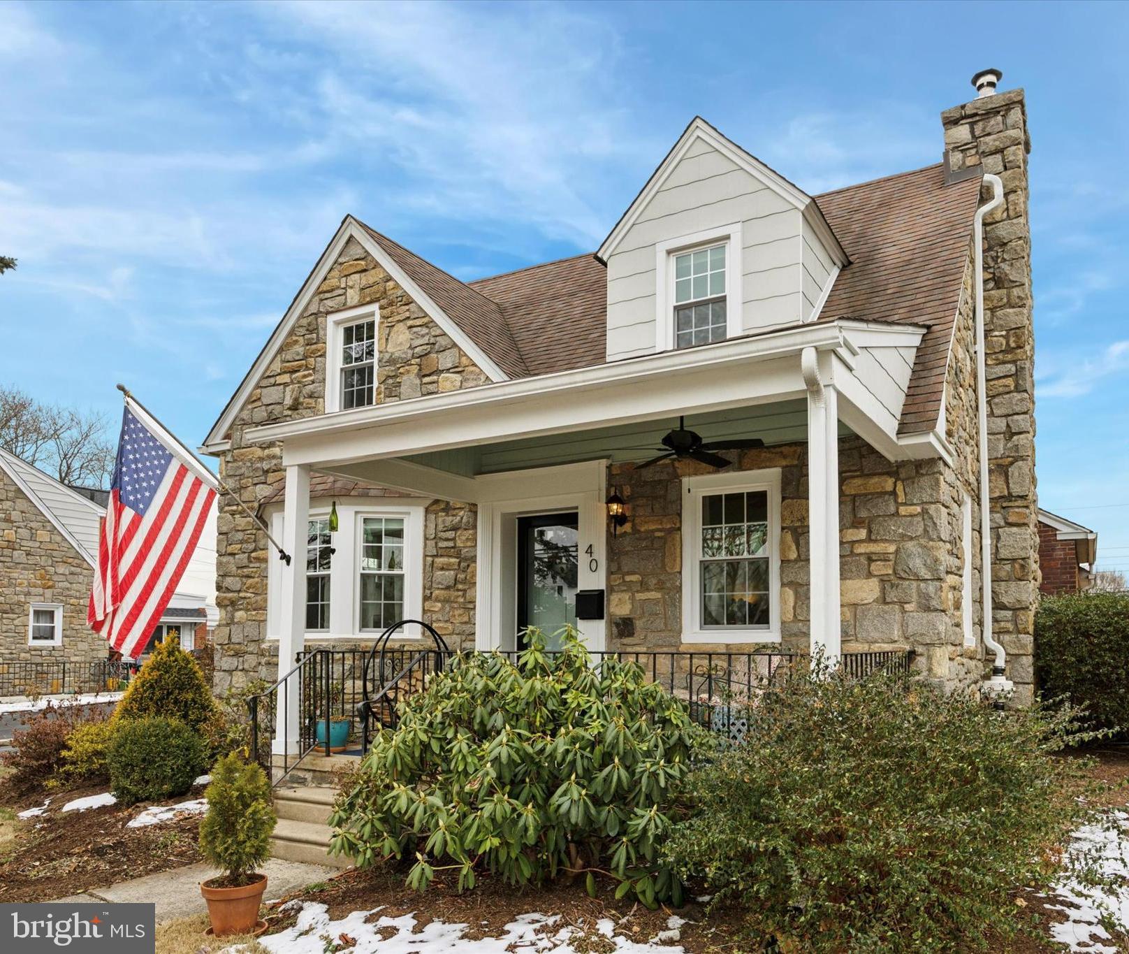This is the one! Welcome to 40 Providence Road, a charming Cape Cod-style home in the Springfield School District. This home has been renovated with love from top to bottom and is owned by only its second owner since being built. As you approach the home, you are greeted by a lovely front porch with a freshly painted tongue-and-groove ceiling and an inviting seating area perfect for enjoying a cup of coffee. Upon entering, you’ll find a welcoming living room complete with a cozy wood-burning stove, hardwood floors, and sightlines to the open-concept kitchen/dining area. The kitchen was renovated in 2020 and is thoughtfully laid out with no detail missed. It features full-ceiling-height shaker cabinets with classic crown molding, Silestone quartz countertops that perfectly complement the cabinets, and stainless steel appliances, including a 5-burner gas range, a 36-inch French door refrigerator, and a stylish Cloé backsplash. There is under-cabinet lighting, recessed overhead lighting, and fantastic natural light from windows on all sides, enhancing the open concept. The 3-seat peninsula is a great space for serving additional guests while entertaining. Picture yourself enjoying gatherings in this inviting space with your loved ones. Next, make your way down to the finished basement, which will surprise you with how wonderful it is! Renovated in 2022, the basement offers versatile options for a guest suite, home office, or entertainment area. It also features an amazing full bathroom with heated tile floors and a gorgeous walk-in shower. The laundry area is neatly tucked into a closet with a butcher block countertop and storage for linens and other items. Don’t miss the storage under the stairs! This basement was meticulously designed to maximize space and efficiency. There is also an unfinished mechanical room tucked in the corner, which houses significant additional storage, the gas furnace, central air conditioning unit, and gas water heater. As you continue your tour, head upstairs to the second floor, which offers three wonderful bedrooms, all with oak hardwood floors. The primary bedroom has ample closet space with room for expansion. The full bathroom features beautifully maintained vintage mint and black tile, exuding style and class. The tub was recently reglazed as well. Last but not least, the home sits on just shy of a quarter-acre lot, with a sizable flat and functional backyard. There is a rear covered concrete patio, a garden area, and a nice storage shed. This home truly has it all and is located in great proximity to major nearby amenities in Springfield's retail corridor, an easy 12-minute walk to the SEPTA line into Center City Philadelphia, a short drive to PHL International Airport, I-476, I-95, and all major commuting routes. Schedule your tour today to see this fantastic home!