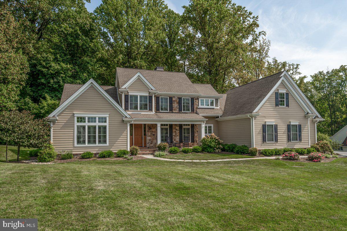 Stunning is the best adjective to describe this lovely colonial in popular Burrows Ridge. Built at the end of 2017, this Bancroft Homes property shows like a model home. No detail was overlooked. It has a wonderful open floor plan perfect for todays living. The kitchen is gorgeous with a huge center island that opens to the adjacent sunroom. The focal point is a custom brick wall with a see through gas fireplace, a unique and timeless feature. The main floor owners suite is beautiful. A freestanding jetted tub and a large walk-in shower highlight this area. There are also large his and her vanities. Plenty of space for all. The second floor has two bedrooms and a large den. Easily converted to a fourth bedroom. The outside patio overlooks a conserved wooded back yard. The cul-de-sac street offers nice privacy for the community. This impressive property is located on the Route 52 corridor, just over the DE/PA line. It has easy access to Route 1 just down the road from world famous Longwood Gardens.