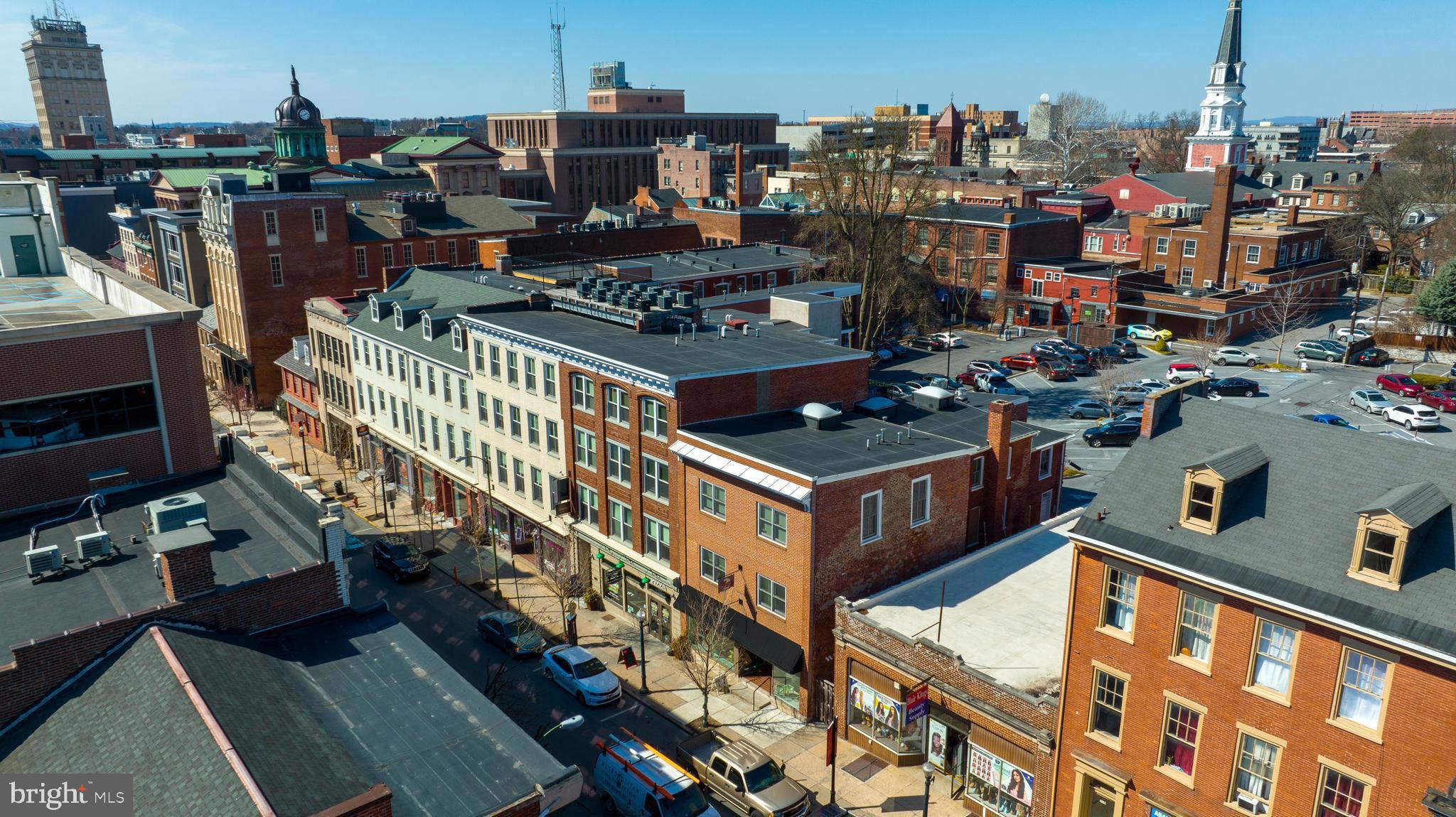 Unit 411 is on the top floor at Historic East Side Condominiums offers quiet living with a peaceful view over Grant Street. The layout includes open living space feels spacious because of the design and natural light. Historic East Side was a complete rebuild of the historic buildings meaning that the structure itself is solid limiting sound transfer from other units. The roof deck looks over Grant Street and you can enjoy the view and hear the birds sing .
This is an outstanding unit with a dedicated parking space and an exclusive garage close to Grant Street entrance. All appliances are staying and the floors, kitchen and bashes all look like new.