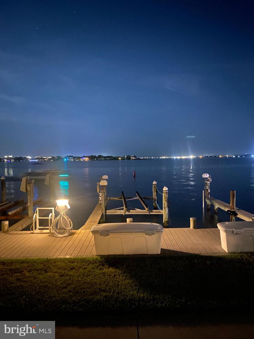 This bayfront beauty has hit the market.  The sunsets are amazing.  First floor entry allows for easy access to common area and dock.  Watching boat traffic coming by, hanging on the balcony and catching the breeze is the best.  Balcony access from master bedroom!  Tile floors in main areas.  Carpet in bedrooms.  Coastal vibe in this beachy condo.  Newly renovated bathroom.  Biking distance or walking distance to many attractions.  This is an ideal location. One assigned parking spot included with 2 guest spots for the building.  There are 6 units in the building.