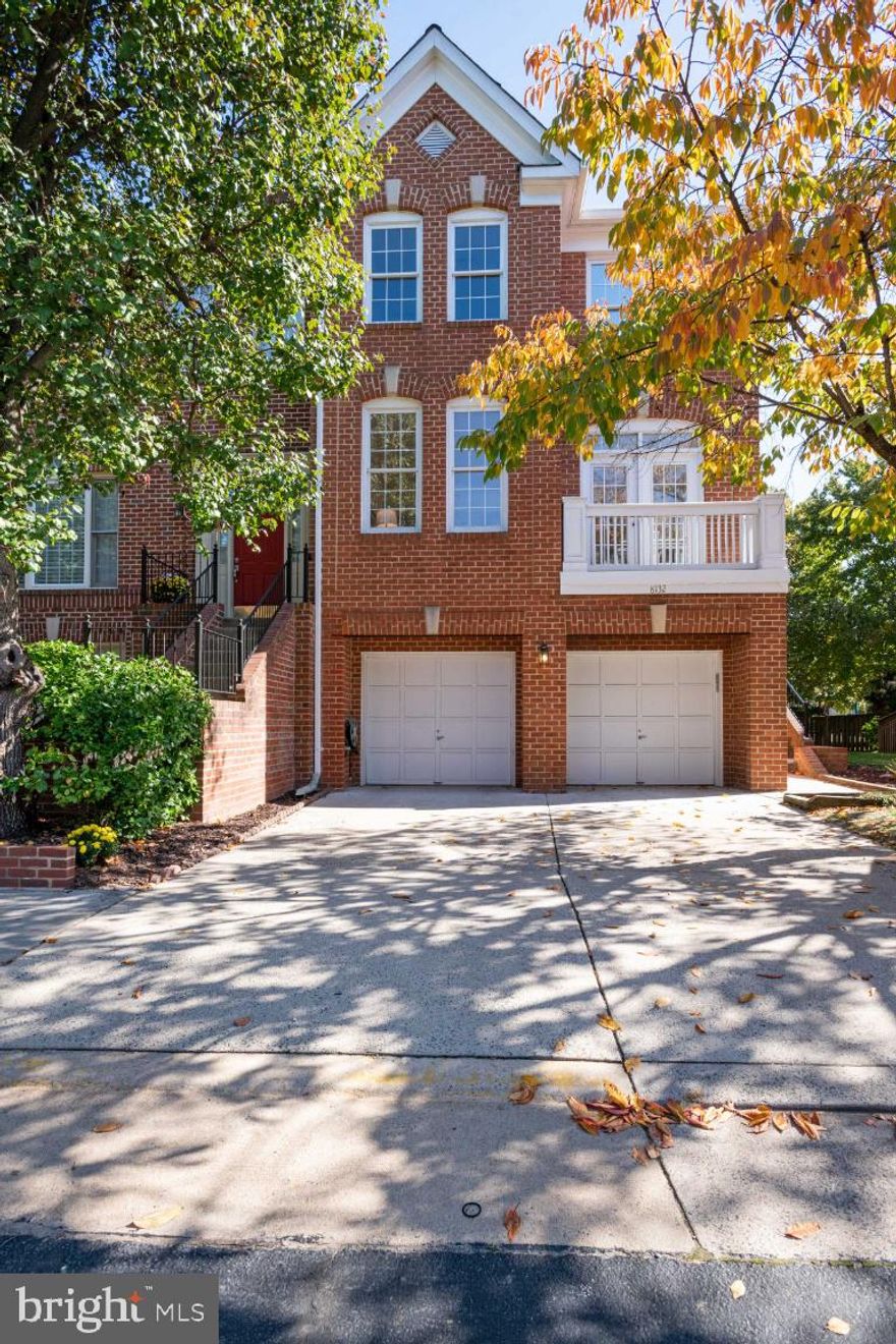 BEAUTY ON BOSS--Stunning 3 bedroom, 2.5 bath rarely available END UNIT townhome with 2-car garage in Tysons Terrace! The home is flooded with light on all three sides, benefitting from southern exposure. Entering the home, you are welcomed by a vaulted-ceiling entryway, fresh paint throughout and beautiful hardwood floors on main and upper levels. Main-level open-plan includes airy 9’ ceilings, spacious formal living room with Juliette balcony, segueing to a formal dining area. Updated kitchen--with breakfast nook, new stainless-steel appliances, quartz counters, plenty of cabinet space and pantry--flows into family room with gas-burning fireplace and sliding doors to generous deck with a spiral staircase leading to a private, fully fenced lower-level slate patio and mature plantings. Upstairs features vaulted ceilings throughout, a primary suite with generous bathroom including jacuzzi tub, separate shower and walk-in closet. Two additional bedrooms and hall bath. Garage-entry lower-level lends to additional comfortable living space--recreation room/home office with new luxury vinyl flooring, gas fireplace, laundry/storage room (plumbed for additional bath), steps to rear slate patio. Premier location, only moments to Tysons Corner and the Town of Vienna shops, dining and entertainment, with easy access to I-495, I-66, Mosaic and Dulles Toll Road!