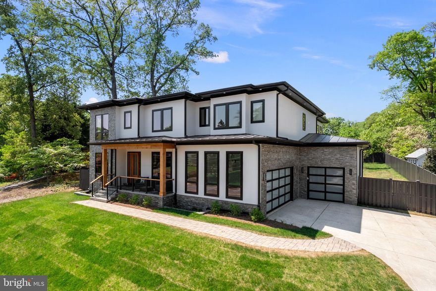 One of a kind opportunity for a brand new home in highly coveted North Arlington. Rarely found  rectangular level lot that could accommodate the pool scene of your dreams! "Landed" landscapes has put together a pool/landscaping plan that can be modified to meet your needs. Meticulously and thoughtfully designed contemporary home was crafted by a leading local builder. Almost 7,400 square feet of living space across three levels boasting 7 bedrooms/7.5 baths and prominently positioned on a rarely found level .34 acre lot backing to almost 10 acres of private parkland. A scene that simply cannot be duplicated. The home features every luxury enhancement imaginable including: elevator to all three levels, Pella windows, 4 gas fireplaces, high end appliances (including Wolf, Sub Zero, Jenn Air, and Cove), separate hidden prep kitchen, extensive electrical work (Josh AI, cameras, remote window treatments, Cat6, Speakers, custom lighting, Ring, EV charging, and the list goes on), exercise room with infrared sauna and steam room, laundry on bedroom level and basement, two covered balconies overlooking parkland, pet washing station in mudroom, 3 car garage, and more! Recently installed privacy fence enclosing entire back yard! Convenient to everything including Washington DC, Virginia Hospital Center, DCA Airport, Washington Golf Country Club, and everything else the DMV area has to offer! Truly a one of a kind opportunity for a completely custom home situated in an unparalleled setting in one of the most desirable areas of Northern Virginia. *Pool/landscaping plan not included in asking price*