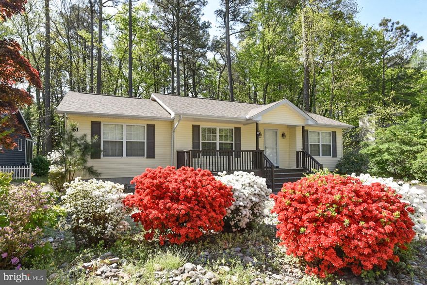 Spacious and open floor plan designed for easy living and effortless entertaining . This inviting home features 3 generously sized bedrooms and  2 full baths  * Sliding glass doors open to a large screened porch * The charming front porch is perfect for enjoying your morning coffee or relaxing  in the evenings with your favorite beverage  * Central Heat /AC for year round comfort *  Abundant closet space and storage shed for all of your beach and boating essentials * You'll love being part of a vibrant waterfront community offering exceptional amenities including 5 pools, tennis, pickleball, yacht club, restaurants,  Robert Trent Jones, Sr designed championship golf course  as well as a  beachfront pool, parking and restaurant in Ocean City *  EVERYTHING you need to embrace the Coastal Lifestyle to the fullest *  Ocean Pines is located just 5 miles inland from Ocean City and blends wooded serenity with Coastal Charm * Fresh paint, new carpeting in bedrooms... Let's make this your home yours *