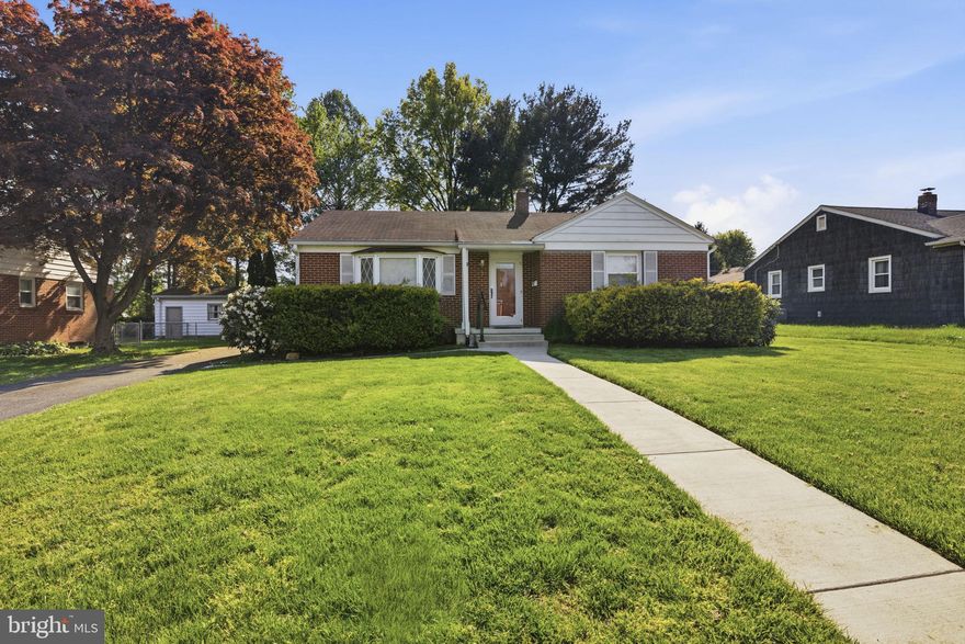 Charming one-level living in the heart of downtown Bel Air! This all-brick rancher offers 3 bedrooms and 1 full bath, complete with a whole-house generator for added peace of mind. A covered front porch welcomes you into the spacious living room, featuring a large bay window, wood trim throughout, and original hardwood floors under the carpet.
To the right, a hallway leads to three bedrooms and a full bath. The kitchen, just off the living room, includes oak cabinetry, double windows over a double sink, an eat-in area, a ceiling fan, and electric cooking. A rear door with a beautiful stained glass window opens to the deck and a fully fenced backyard.
Bedroom three offers flexibility and can also be used as a formal dining room. The lower level features a partially finished basement with hopper-style windows, a mechanical closet, and additional space ready for your finishing touches. The utility room includes a washer and dryer, a sump pump, shelving for extra storage, and access to storage under the stairs.
Outside, enjoy a flat, fully fenced backyard that backs to trees. The driveway extends past the home to a side gate for convenient access.
A wonderful opportunity in a prime location close to everything Bel Air has to offer!