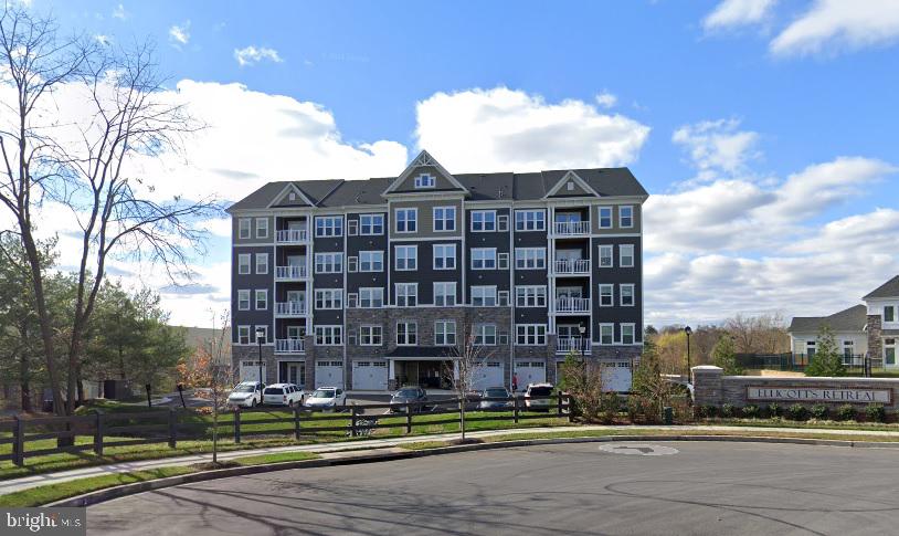 Highly desirable 55+ senior community in Ellicott's Retreat. This former-model home features 2 bedrooms, 2 full bathrooms, and a loft. Luxury vinyl plank flooring in the living room and kitchen. Granite countertops and backsplashes, with optional extra storage space available. The cozy living space is enhanced by a fireplace. The primary bathroom features an upgraded bathtub. The home also offers a spacious loft with a metal baluster staircase. Oversized garage that can be accessed from inside of building. Conveniently located and just minutes away from Walmart, grocery stores, and shopping centers. Enjoy maintenance-free and comfortable living.