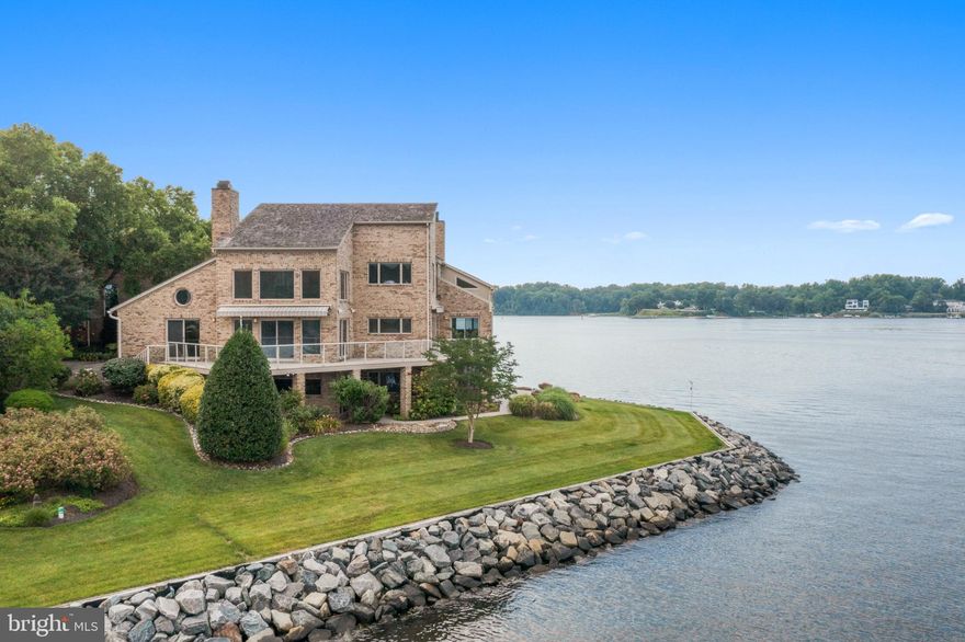 This incredible waterfront was  Under Contract with a home sale contingency from the buyers. Unfortunately, the buyer's home did not settle on time.  Look at the magnificent opportunity to have this five-million-dollar view of the South River. Experience these expansive views that mesmerize you as the sun rises and sets to captivate your senses. From the moment you step into the marble entryway through the solid mahogany doors, you sense the uniqueness. Each room is meticulously designed to immerse you in the breathtaking water vistas, blending nature's beauty into your daily life. The first-floor in-law suite with a private entrance and kitchenette provides a comfortable and secluded space for guests or extended family—two custom libraries featuring built bookcases highlighting your literary collections. Throughout the house, three gas fireplaces create cozy nooks, perfect for quiet moments. The spiral staircase leads you to the luxurious primary bedroom suite, two Calf, offering a custom dressing area. Designed walk-in closets and ensuite luxury bath. The lower level is finished, including three large bedrooms and a club room with full daylight and views. In addition, there is a separate dedicated fitness room, allowing you to stay active without ever leaving the comfort of your home.  

The allure of the outdoors beckons with wraparound decking adorned with awnings, providing many options for enjoying the ever-changing water views. The hardwood and tile floors, complemented by skylights, bathe the interior in natural light, creating a warm and inviting atmosphere. Three separate zone heating and air conditioning systems allow you to customize to suit your preferences. 
A full-sized generator valued at over $25K is included, ensuring comfort and convenience. The price includes A separate deeded 50-foot boat slip with a boat lift, water, and electricity. 
Outside, lush landscaping with mature plantings adds to the tranquility of the surroundings, while an underground sprinkler system maintains the beauty. Security is paramount in this gated community, and a 24/7 gate entrance provides peace of mind. Residents can use the community's amenities, including a pool at the water's edge, tennis and pickleball courts, basketball courts, walking paths, and a playground.
For those seeking the perfect balance between serenity and accessibility, this waterfront haven offers proximity to downtown Annapolis, just minutes away. Explore an array of dining options, indulge in shopping, and the vibrant atmosphere of Annapolis City Dock. The United States Naval Academy (USNA) stands as a testament to the city's rich history, while commuter routes such as routes 2, 50, and 97 provide effortless connections to Wash DC., BWI Airport, and Baltimore.
Owners are requesting interested buyers make an offer.