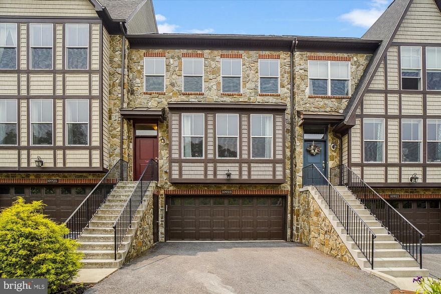 Rare three level townhome in the sought-after Westwinds neighborhood of Lake Linganore, with three bedrooms, 2.5 bathrooms, and 2 car garage. Main level features a light filled open living/dining/entertaining space including an extended gourmet kitchen with stainless steel appliances, granite counters, double ovens, built in wine rack, sleek hardwood floors, upgraded architectural details, fireplace, and powder room! Upstairs, you’ll find a primary bedroom with UNBELIEVABLE mountain views, two generous walk-in closets, huge en suite spa bathroom with soaking tub, separate shower, privacy WC and double vanities; down the hall, a full bath, laundry room with shelving, and two bedrooms with ceiling fans and great views! Lower level boasts brand new flooring and paint, fenced backyard, and two-car garage with additional driveway parking. Spectacular nature views of the parkland from both the front and back of this home, and sitting adjacent to one of the numerous walking trails! This gorgeous townhouse affords you access to everything that Lake Linganore has to offer so enjoy that lake lifestyle with access to the beach, lake, tennis and pickleball courts, tot lots, basketball, soccer fields, picnic spots, event tent, walking and biking trails, golf cart trails, multiple swimming pools, community dock, kayaking, and sailing! This home will not last! Unmatched amenities, you won't find a better value in the region!