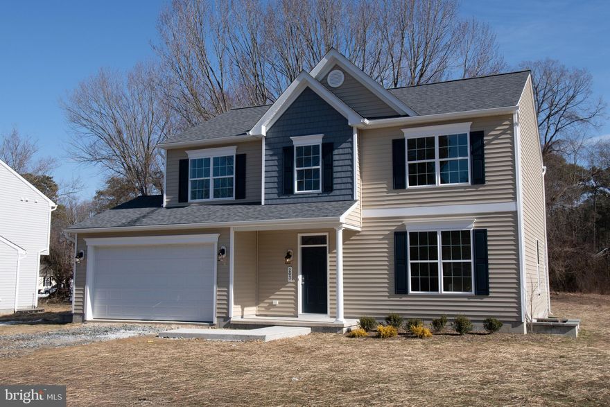 Move-in ready and brimming with upgrades, this brand-new 4-bedroom, 2.5-bath colonial in Grasonville is designed to impress! With an abundance of storage space and thoughtful details throughout, this home is perfect for both family living and entertaining.

As you enter, you’ll be greeted by a spacious open floor plan featuring upgraded trim and luxurious LVT flooring throughout the main level. The upgraded kitchen is a chef’s dream, complete with a large island, sleek quartz countertops, stainless steel appliances, and more. The inviting Great Room seamlessly flows into the kitchen and well-lit dining area, creating a perfect space for casual family meals or larger gatherings.

Just off the kitchen, you’ll find a versatile office or playroom overlooking the large backyard, as well as access to the 2-car garage. Upstairs, the expansive Owner’s Suite offers a private bath and walk-in closet, providing the ultimate retreat. Three additional generously sized bedrooms, a full hall bath, and a convenient second-floor laundry room round out this beautiful home.

The private backyard, backing to tranquil woods, offers an ideal setting for relaxing or entertaining in peace. With a location that combines privacy and convenience, Grasonville is perfectly situated for easy access to dining, shopping, and major highways, all at an affordable price.

Take advantage of this builder promotion, closing help when using the builder’s preferred lender and title company. Contact the sales agent for more details!