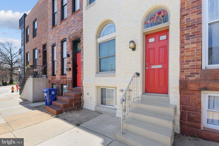 Welcome home to 1528 Covington St! This 2 bed, 2 bath rowhome is one of a kind. The main level features an open concept living room, dining room and kitchen equipped with gorgeous original hardwood floors, exposed brick and a beautiful fireplace. The kitchen features stainless steel appliances, a range/hood gas stove, a breakfast bar and plenty of storage space. An enclosed patio is directly off of the kitchen, perfect for entertaining! Upstairs you will find two bedrooms with generous sized closets and two full bathrooms, both en-suite with one being hall-accessible as well. Original hardwood floors are also on this level. Natural daylight soars throughout the home! The unfinished basement offers laundry and tons of storage space. Just steps away from Riverside park, this location cannot be beat! Recent updates include a new roof (2020), windows replaced (2016), fresh paint and more! Schedule your private showing today! Note, home is sold "as is".  OFFER DEADLINE OF MONDAY 3/21 BY 5PM!