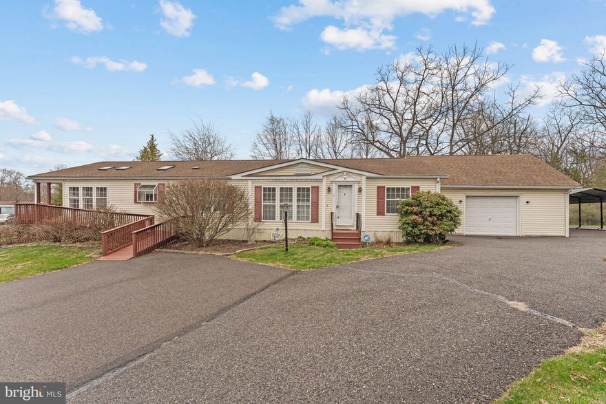 Welcome to this beautifully maintained and spacious 3-bedroom, 2-bath home located on a quiet cul-de-sac in the desirable Melody Lakes Country Club community in Quakertown, PA!

Offering approximately 1,700 square feet of comfortable living space, this 1992 home features a bright and open layout with 2 newly updated bedrooms, making it truly move-in ready. The home is equipped with an efficient electric heat pump and central A/C, along with a cozy propane fireplace perfect for added warmth and ambiance.

The kitchen and living areas provide plenty of space for everyday living and entertaining, while the large deck offers the perfect outdoor setting to relax or host gatherings.

Parking and storage are a major bonus with a large driveway, oversized one-car garage, and additional carport—ideal for multiple vehicles, tools, or hobbies.

Located in a well-maintained community, residents enjoy access to a community pool and a peaceful neighborhood setting, all while being conveniently close to shopping, dining, and major routes.

Don’t miss this opportunity to own a spacious, updated home in a great location—schedule your private showing today!