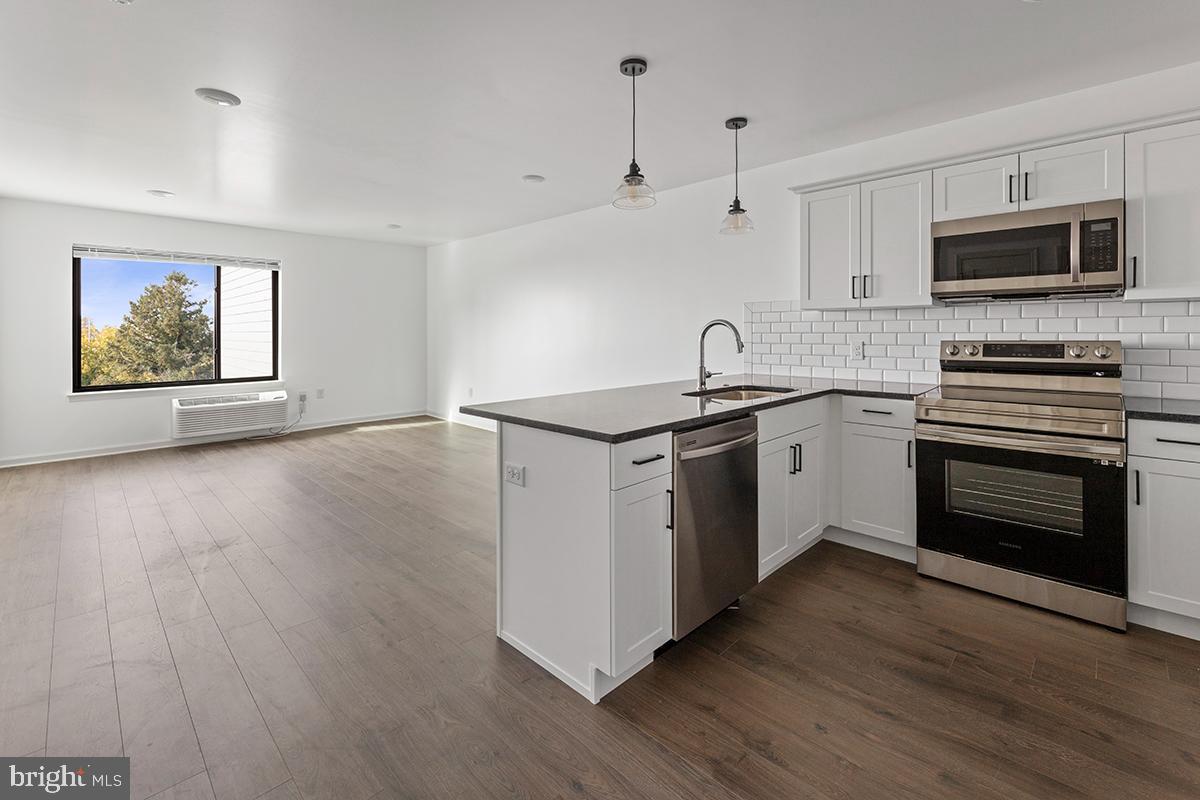 Available October 1st! - Spacious One-bedroom coming available at The Wright - a new construction apartment community in the heart of Roxborough! Your new home includes open-concept living/kitchen area, with fully-equipped kitchen including granite countertops and stainless steel appliances. Easy-to-clean wood-inspired flooring throughout, plus in-unit Washer/Dryer, and intercom system. PTAC climate control allows temperature set by room so you're comfortable year-round. All residents at The Wright can access the green roof deck, and off-site fitness center for no additional charge. Plus, The Wright is100% pet-friendly with no additional fees. This home is a must-see - apply today!