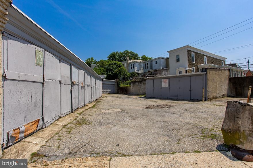 14 garages and 2 off street Parking Spaces.  All rented out.  Monthly Income.  This Property is being sold with 5236 Ridge Avenue as a package.  these garages are being sold AS IS.