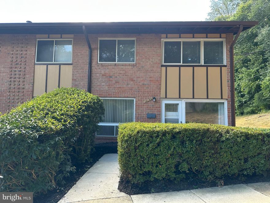 NOTE; Seller will contribute $5,000 toward a buyer's closing costs with an acceptable contract.   
If you are looking for privacy, this is it!  An end two level townhouse that looks and feels like a new home! Light and bright! with  upper level 3 brs & 1.5 baths.  Laundry room on main level with washer & dryer.   Remodeled from top to bottom.   Fresh neutral paint throughout!!!   New Kitchen has white marble counter tops,  new white cabinets with under cabinet lighting. Fabulous new pergo flooring on the main level ,  new stainless sink, all new GE stainless steel appliances including side by side refrigerator with water and ice in door, gas stove, built in microwave and dishwasher.  Laundry room  with new cabinets and new  washer and  1 yr old dryer.  Completely remodelled powder room with newly added extra cabinets, tiled flooring and walls.   New carpeting on stairs to upper level and on hallway; restained hardwoods in all 3 bedrooms. Each bedroom has large closets.  Upper bath completely remodled.   New HVAC compressor and furnace;  water heater is one year old.   Beautiful  outdoor tile  patio  backing  to private and quiet wooded area.   Convenient location close to Vienna Metro, public transportation, Rts. 50,  495 and 66.   Close to shopping, restaurants, schools,  CVS, Patient First and Amazon Fresh, Giant, and Home Depot. Hurry! This one will go fast.