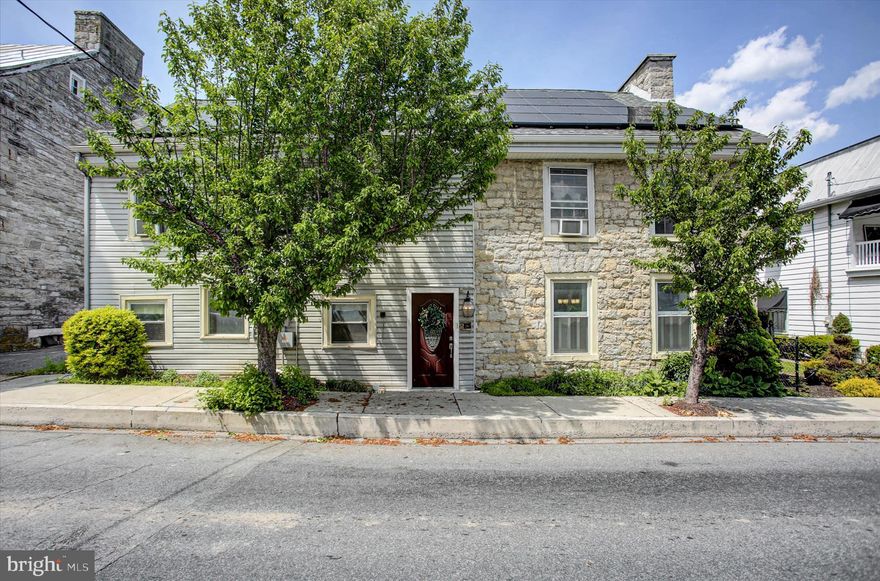 Welcome to this charming historic home, originally built in 1804 and thoughtfully maintained to preserve its character. This unique property combines two residences into one, offering more space than many homes in the surrounding area. Conveniently located near local shops and dining, it sits in the heart of Newville. The home features four bedrooms, two and a half bathrooms, and original pine hardwood floors throughout the first floor. The fenced backyard spans approximately 0.21 acres and includes a covered patio with a hot tub—ideal for outdoor enjoyment. New roof and solar panels are installed to help reduce utility costs and improve energy efficiency. A second entry provides additional flexibility for a variety of living arrangements or potential uses, subject to local regulations. Don't miss your chance to tour this home!