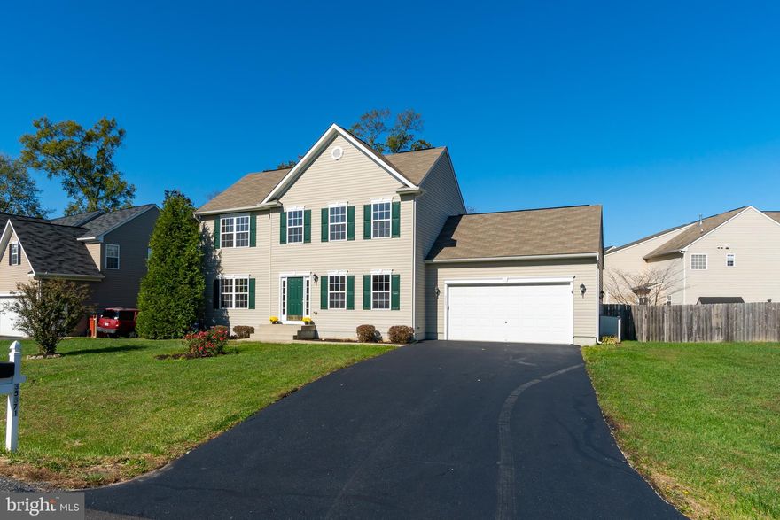 Are you looking for new construction but do not want to wait? This home has just been freshly painted top to bottom and all new neutral carpeting and fixtures too!  When you enter this home all you need are your bags! The open concept allows you to be part of the conversation no matter where you are on the main level.  Sit and read a book in the library area in front of the fireplace or hang out in the oversized family room and watch your favorite show.  The Main Bedroom is a generous size and the bathroom has a large soaking tub and separate shower...oh and do you have the need for a larger walk in closet? No problem you will have this too! The other 3 bedrooms are a great size and so are the closets! The basement is partially finished with room to expand and add a true 5th bedroom and roughed in for a 3rd full bathroom too! The backyard is ready for your next gathering with a beautiful patio and yes it is fully fenced in too!