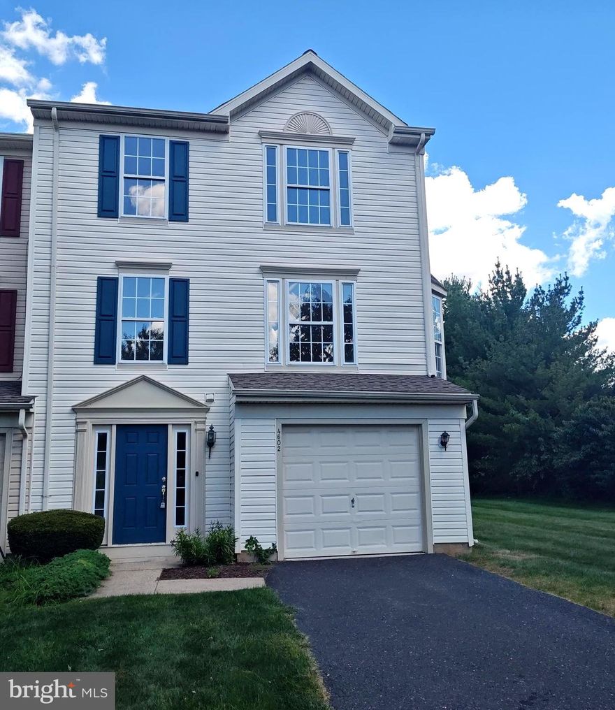 This charming end-of-row townhouse in the desirable Countryside at Upper Saucon community offers a perfect blend of comfort and convenience.  Spend more time enjoying life and less time working on it!!   This home features three spacious bedrooms and two and a half bathrooms, making it ideal for both relaxation and entertaining. Step inside to discover an inviting open floor plan that seamlessly connects the kitchen and dining area, perfect for gatherings. The kitchen boasts a central island, ideal for meal prep or casual dining, and is equipped with modern appliances, including a self-cleaning oven, built-in microwave, dishwasher, new disposal and refrigerator. The open floor plan and tons of windows alow the sunlight to pour into the home creating a warm, bright, inviting space.  Retreat to the primary suite, featuring a luxurious soaking tub and a walk-in closet, providing ample storage. Additional highlights include a convenient lower-level laundry area and a combination of carpet and stylish flooring throughout. Outside, enjoy the fresh air on your private deck, perfect for morning coffee or evening relaxation. The community takes care of lawn maintenance, snow removal, and trash, allowing you to spend more time enjoying your home. With an attached garage and additional parking options, convenience is at your doorstep. This home is not just a place to live; it's a place to create lasting memories. Don't miss the opportunity to make it yours!