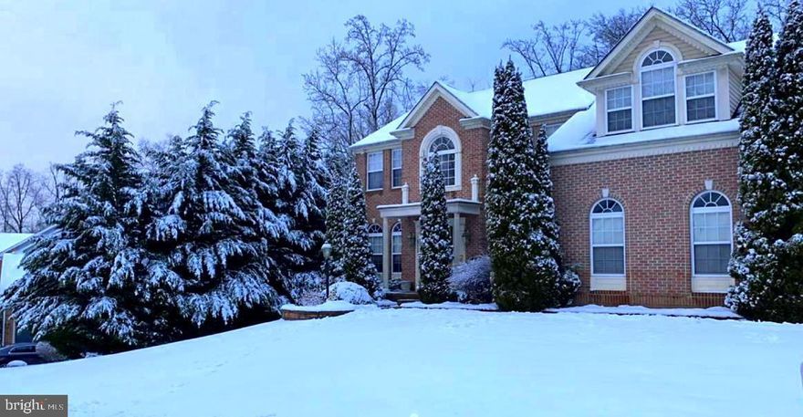 Showings available March 1st—17th only !!!  The seller reserves the right to review and ratify a contract at any time, and once a contract is accepted, showings will close immediately.  Don’t miss your opportunity to secure your home in an exceptional community.  Welcome to this spacious Colonial home nestled in the sought-after Perry Hall neighborhood, set on a generously sized lot of over half an acre.  A large deck provides the perfect setting for outdoor entertaining and memorable family gatherings.  Inside, the home offers an open floor plan with kitchen, sunroom, and family room with fireplace as well as five large bedrooms, three and a half bathrooms, and a finished walk-out lower level basement designed for relaxation and fun.  This inviting space features a club room, pub-style bar with pool table, full bathroom, and a flexible area idea for a  home office, or guest room.  Ring camera at doors and other cameras on the interior of home