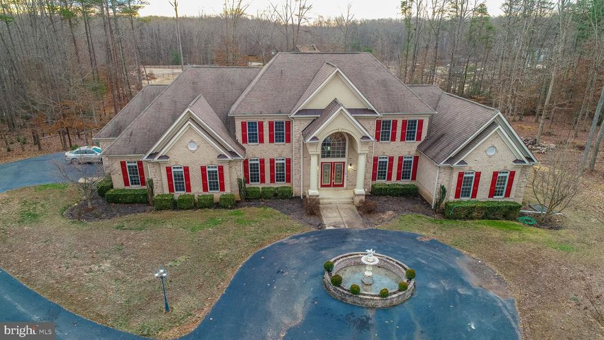 This stunning  Colonial home in Fauquier County Virginia is approx 10,000 SF with walk out basement on 10 acres. with multiple rooms, Could also be used as a Multi family home, 2 laundry rooms, 2 kitchens and 3 Master Bedrooms one with spa tub and mini fridge and fireplace.  Large fountain out front. Basement in-law suite. Wired unifi mesh internet network (3 units) Basement wired for 7 TV's and central sound system. A must see.