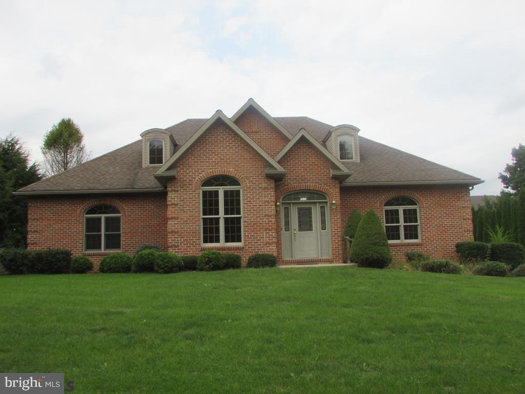 Are you looking for a first floor master bedroom with a stunning master bath? This elegantly built solid brick house, with uncompromising quality, commands attention. Every detail was meticulously thought out, from the solid cherry cabinets, dovetail drawers, and granite kitchen. To the wide dramatic cherry grand staircase that leads up to the upper level. Plush carpet awaits in the bedrooms, family room, formal dining room, and living room. The first floor laundry room, kitchen, bathrooms, and spacious pantry are beautifully tiled. Attached is a 2 car 2 deep garage which can easily store 4 vehicles! Walk or bike, you are minutes to downtown, shopping, popular restaurants, and located in the highly coveted Teaberry Ridge neighborhood! Book your showing today. This much quality at this price will not last! Seller says BRING AN OFFER!