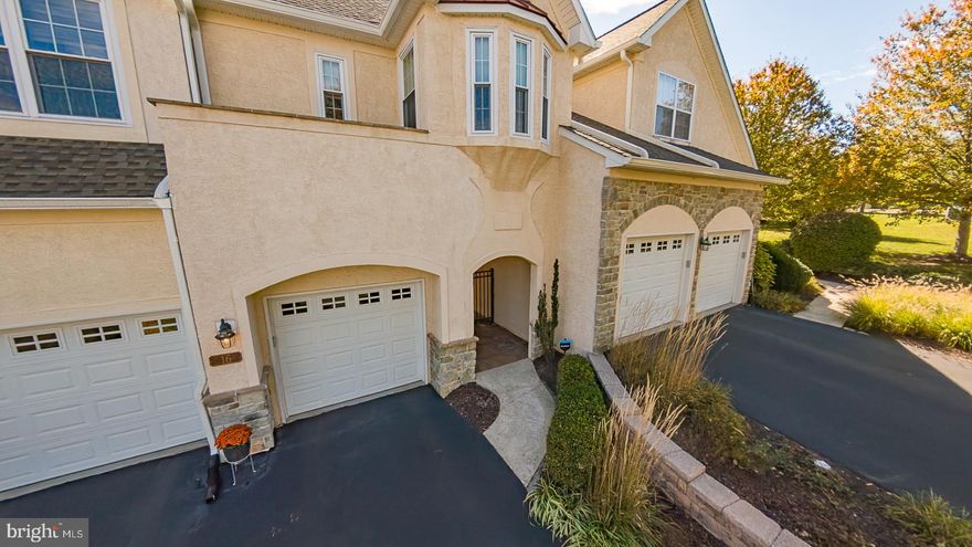 Absolutely luxurious carriage home in sought after Cherry Creek! One of the very few units with a private elevator for convenience. This elegant home features 3-bedrooms, 2 full and 2 half-baths (Amherst model) offers elegance, comfort, and privacy, all nestled on a premium lot backing to woods. From the moment you enter the private courtyard, you’ll notice the superior craftsmanship throughout. The main level features hardwood flooring, extensive custom trim, wider mouldings, and a two-story foyer that opens to a formal dining room adorned with elegant woodwork and recessed lighting. A double-sided gas fireplace connects two spacious living areas, one side with sliders to a private rear deck—perfect for entertaining or relaxing  with a scene of wooded views. The gourmet kitchen is absolutely perfect featuring granite countertops, upscale cabinetry, a Wolf 6-burner gas range, stainless GE appliances & sliders to the courtyard as well as interior access to the attached 2-car garage. Upstairs, the large primary suite includes a tray-ceiling , a private reading or office area, his and hers walk-in closets with custom organizers, and a spa-like en suite bath with a soaking tub, walk-in tiled shower, and double vanity. Two additional bedrooms, a full hall bath, and a laundry room complete the second floor. The finished walkout basement expands your living space with a large family room, high end new LPV flooring, gas fireplace, wet bar, powder room, and a bonus room ideal for a home office or fourth bedroom. There is also 2 areas for wonderful storage. Step outside to the rear paver patio, surrounded by serene open space—perfect for outdoor entertaining. Cherry Creek offers over 80 acres of preserved open space, natural wetlands, walking trails, and sidewalks. Roof & HVAC are approximately 2 years old. Roof done by Association & they are responsible for roof/gutters. Home is located near Routes 1, 202, and 322, with easy access to Wegmans, Whole Foods, tax-free Delaware shopping, fine dining, and historic attractions. Located in the highly regarded West Chester School District, just minutes from vibrant West Chester Borough.