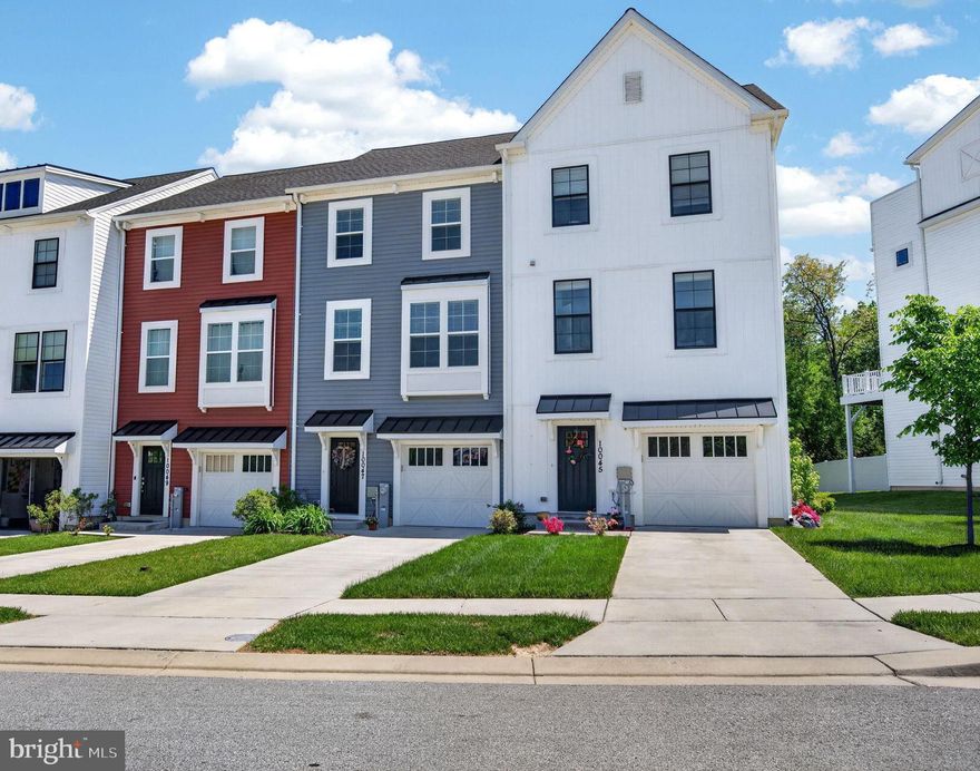 Lovely Move-In Ready Modern Townhome. Stop your search here! This six-year-young, move-in-ready home is perfect for homebuyers looking to plant roots. Built in 2020, this three-level modern townhome offers a vibrant, bright, and incredibly welcoming atmosphere from the moment you step through the front door. Level One: Flexible Living & Outdoor Fun. Step into a generous foyer featuring stunning luxury vinyl plank (LVP) flooring and neutral paint. The lower level offers an incredible flex space that easily adapts to your specific needs. Use it as a fourth bedroom with its own en-suite full bathroom, a home office, a gym, or a recreation room with plenty of space for a pool and a ping-pong table. A sliding glass door leads you out to a large, flat, private backyard lined with mature trees. This is a fantastic spot for enjoying yard games, entertaining friends, or starting a garden. There is a single-car garage with built-in storage cabinets, easy access to the enclosed HVAC, and convenient interior access. Level Two:
Open-Concept Living at Its Best. Head upstairs to experience bright, open-concept living. The second floor boasts a beautiful, large kitchen that makes cooking fun. You will love the massive rectangular island with a granite countertop, designer pendant lights, and a large sink. Modern 42-inch white cabinets, stainless steel appliances, a gas stove, and ample pantry space complete this dream kitchen. The space flows seamlessly into a dining area and a huge great room bathed in natural light from oversized
windows. Beautiful LVP flooring runs continuously throughout this entire level. Level Three: Rest & Recharge. The top floor provides a peaceful retreat for the whole household. The large primary bedroom features an en-suite bathroom and a generously sized walk-in closet. Two additional bedrooms and a full hall bathroom give everyone their own comfortable space. For ultimate ease, the hallway houses a dedicated laundry area with a full-size washer, dryer, and shelving tucked neatly behind closed doors. A Highly Convenient Location Enjoy a remarkably convenient location just minutes from incredible shopping, dining, and entertainment in Towson, White Marsh, and Hunt Valley. Commuting is an
absolute breeze with quick access to major routes, including I-695, I-83, and U.S. Route 1. This lovely, move-in-ready townhome offers the perfect blend of comfort, style, and everyday functionality. Get ready to enjoy your next chapter. Schedule your private tour today!
